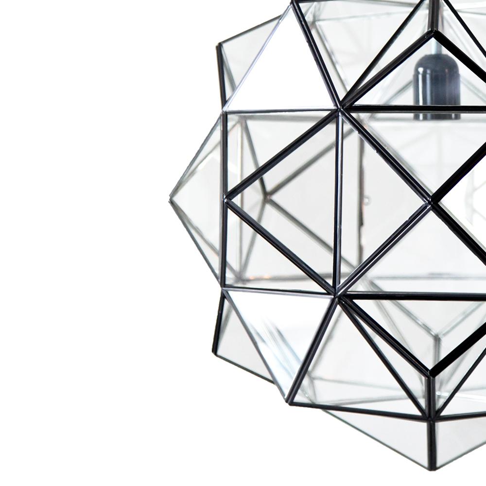 These glass lanterns are made in a generations-old workshop in Granada, Spain. Each pendant light is hand forged, and reflects the influence of Moorish design that can be observed throughout the region.

With their multitude of diamond-shaped panes