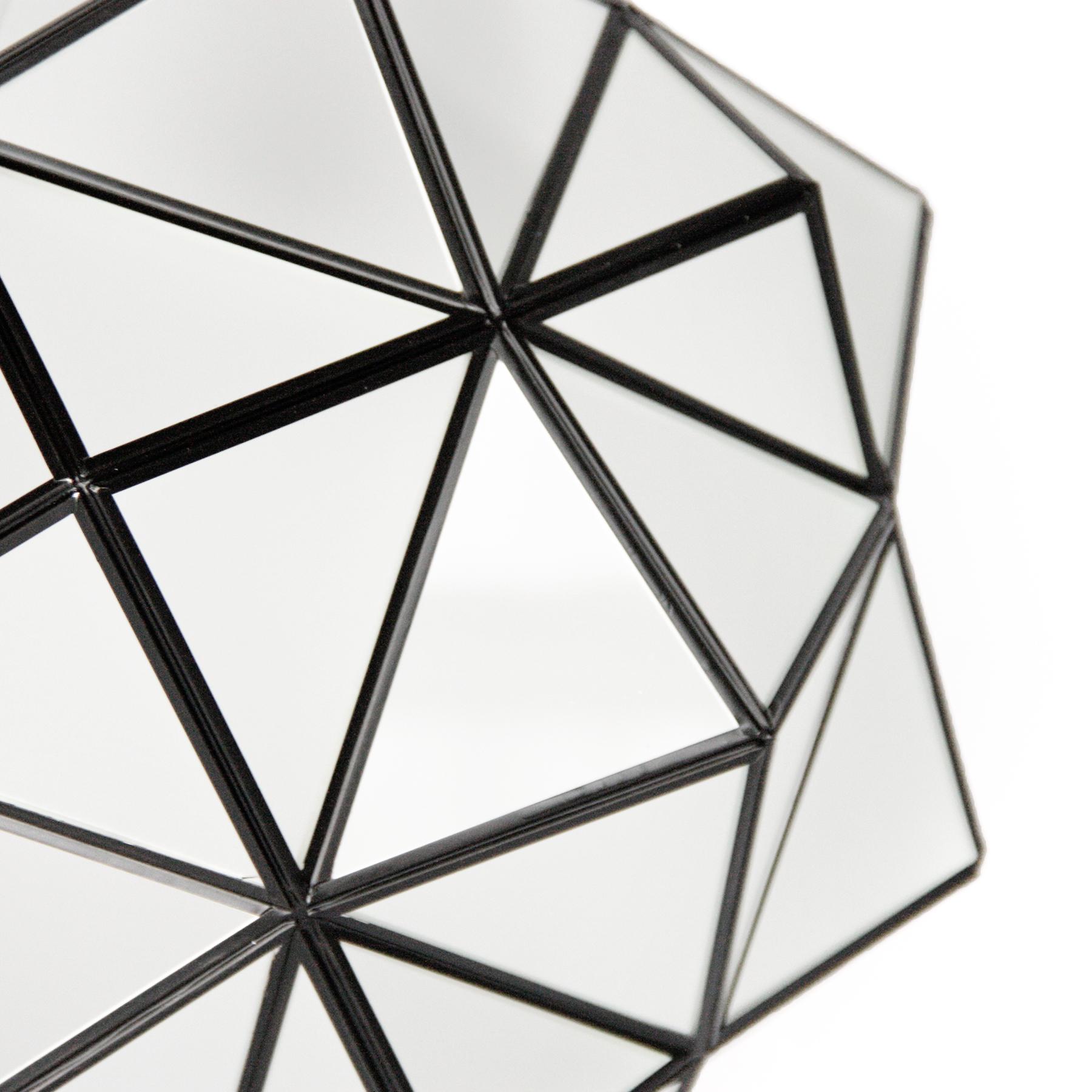 These glass lanterns are made in a generations-old workshop in Granada, Spain. Each pendant light is hand forged, and reflects the influence of Moorish design that can be observed throughout the region.

With their multitude of diamond-shaped panes