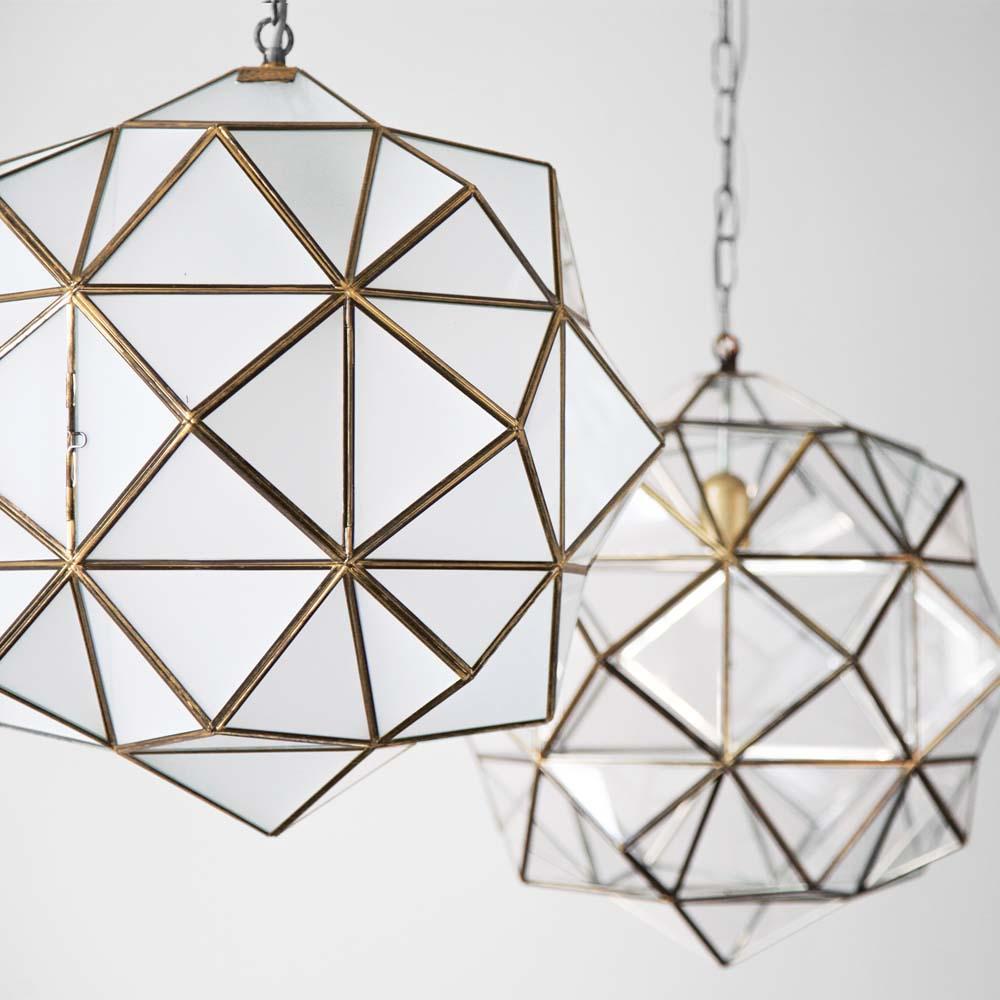 These glass lanterns are made in a generations-old workshop in Granada, Spain. Each pendant light is hand forged, and reflects the influence of Moorish design that can be observed throughout the region.

With their multitude of diamond-shaped panes