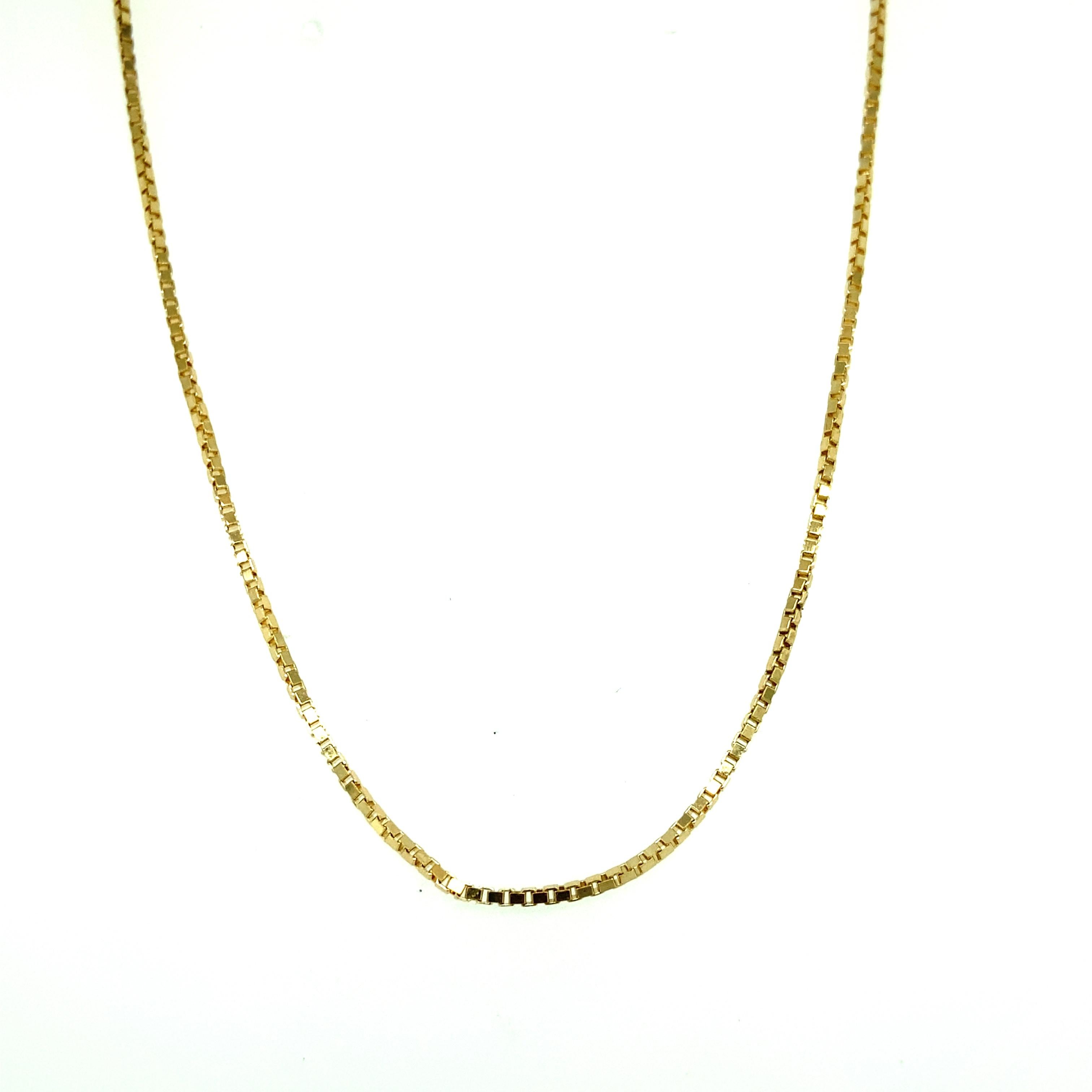 One 14 karat yellow gold box link chain measuring 24 inches long complete with a spring ring clasp.  