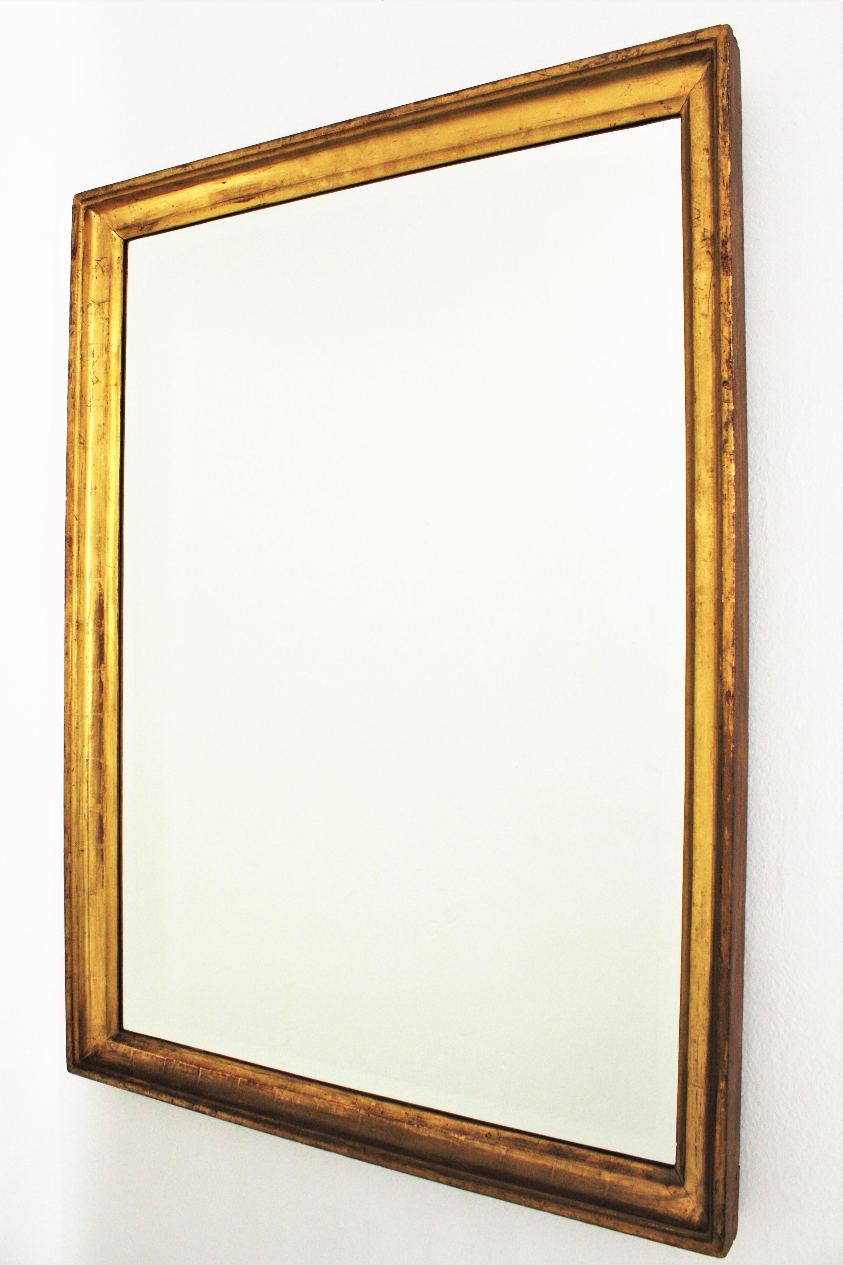 24-Karat Gold Leaf Giltwood Empire Beveled Mirror In Good Condition For Sale In Barcelona, ES