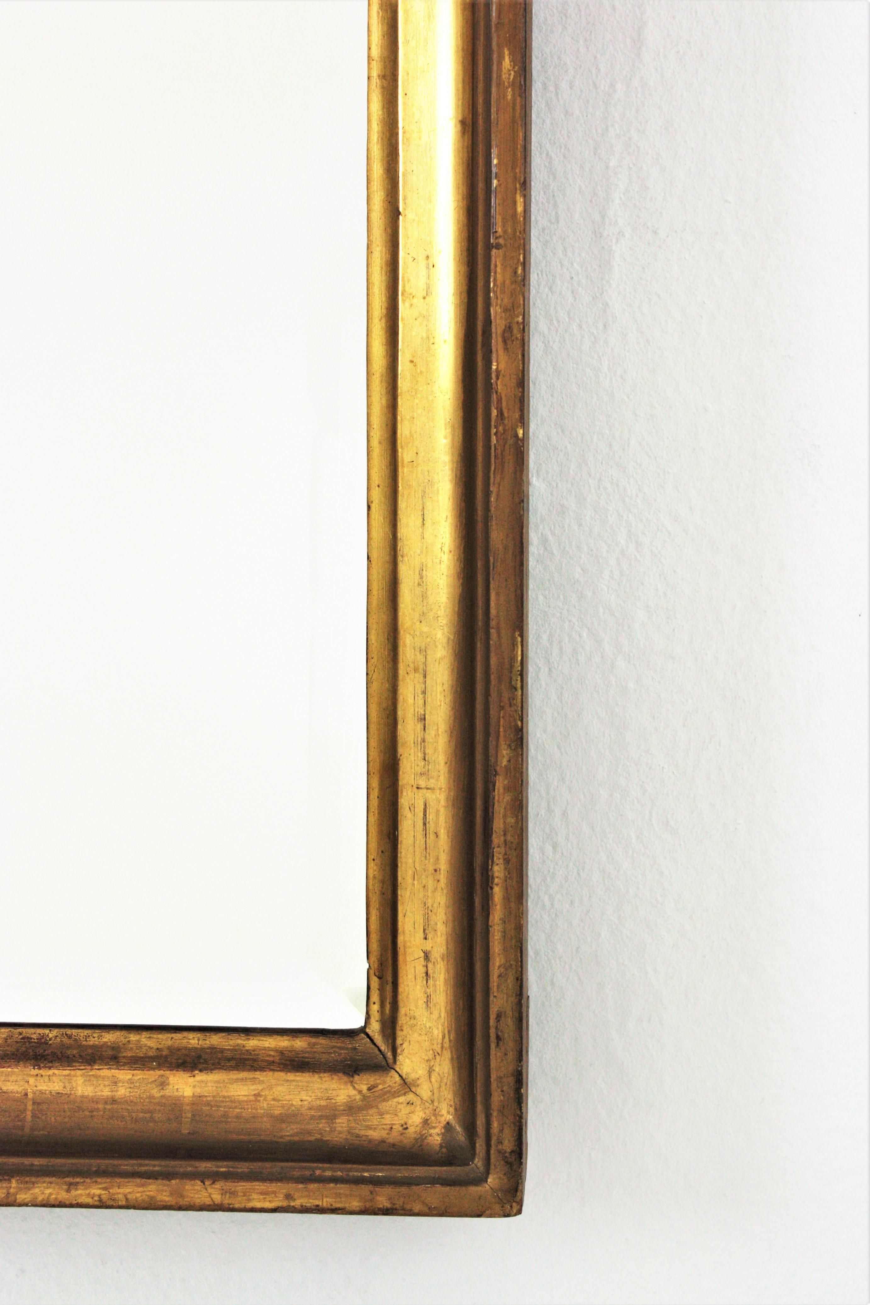 19th Century 24-Karat Gold Leaf Giltwood Empire Beveled Mirror For Sale