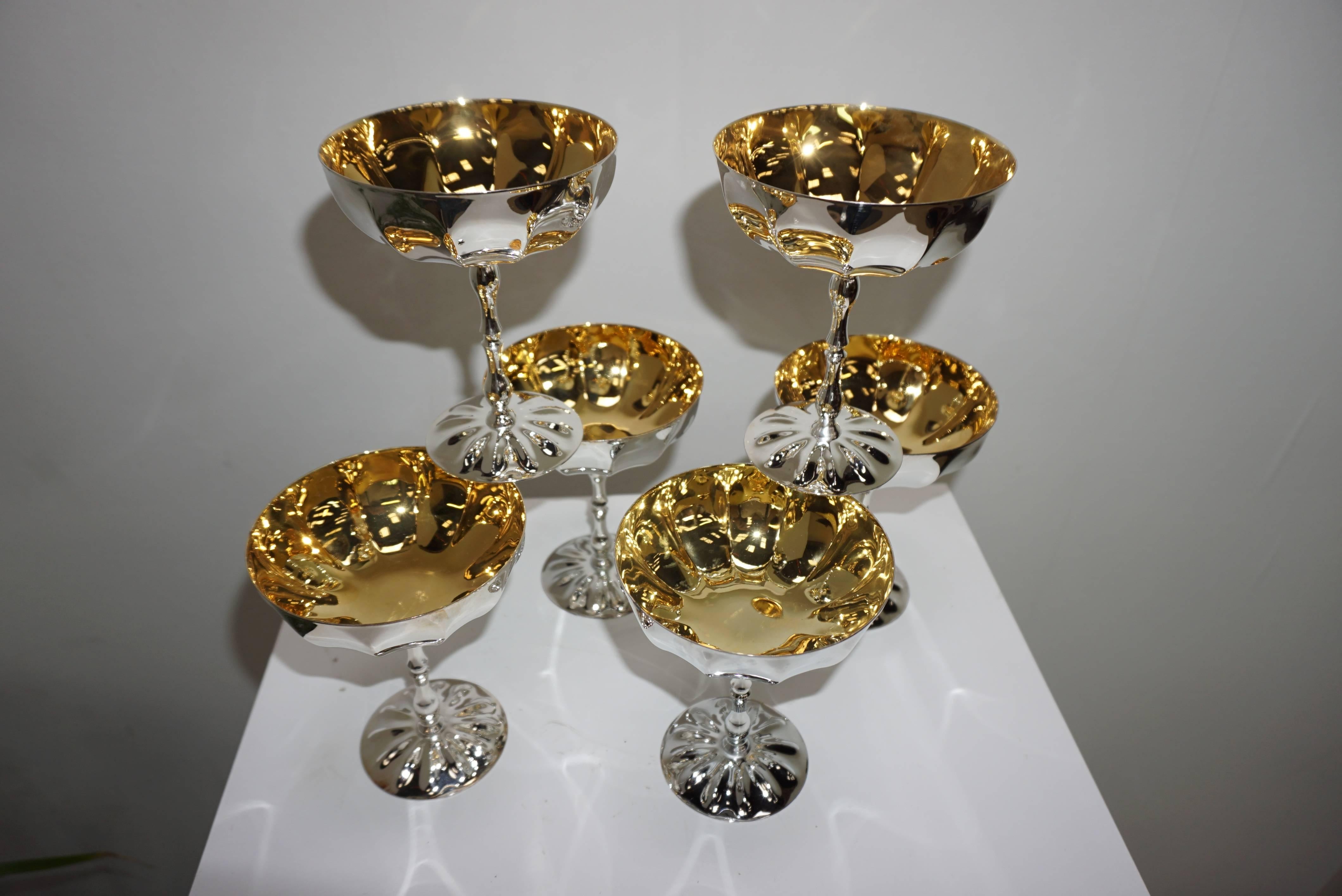 Set of 6, 24-karat gold-plated and silver plated cups. Straight from a European palace, these dishes have never served. They can be served for wonderful desserts as well as served a vintage champagne.
Several sets available.
  