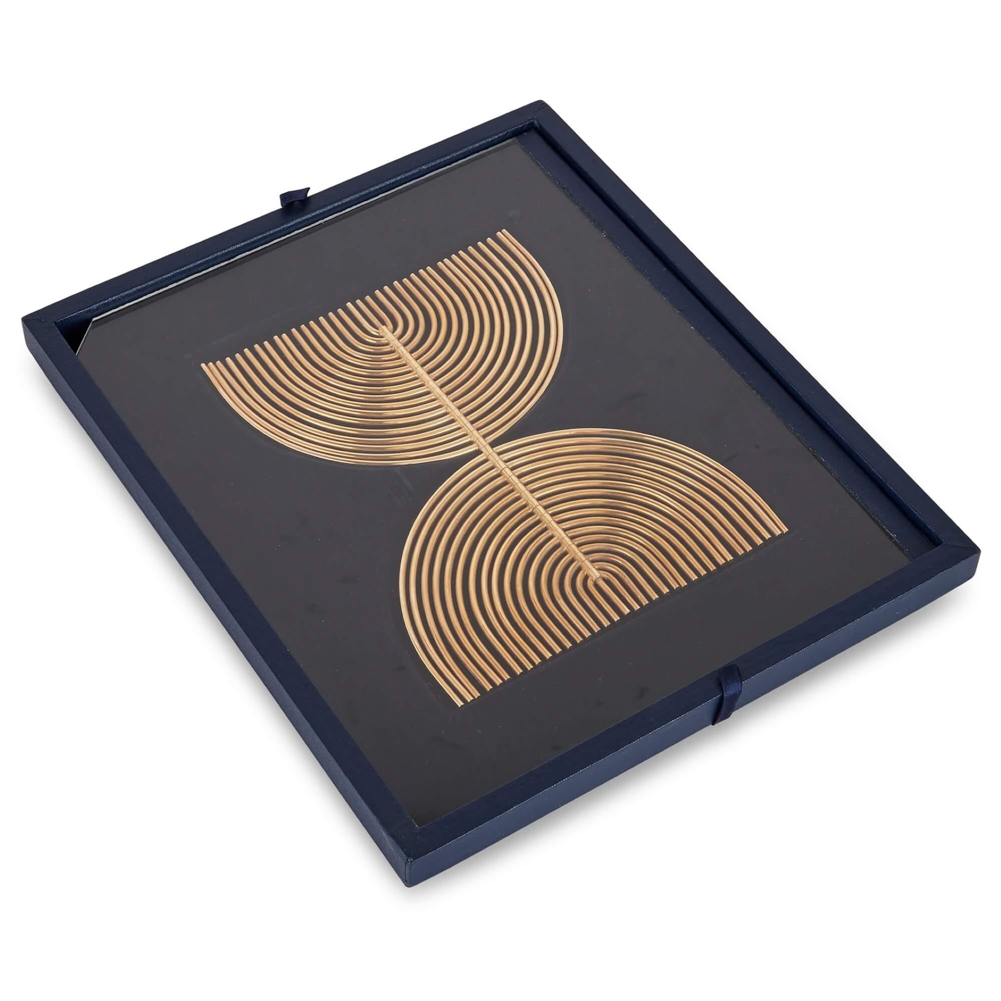 24 karat gold plated menorah sculpture by Yaacov Agam
Israel, c.1988 
Menorah: Height 22cm, width 17cm
Case: Height 37cm, width 32cm, depth 8cm

This limited edition menorah sculpture was designed by the Israeli sculptor, Yaacov Agam in the late