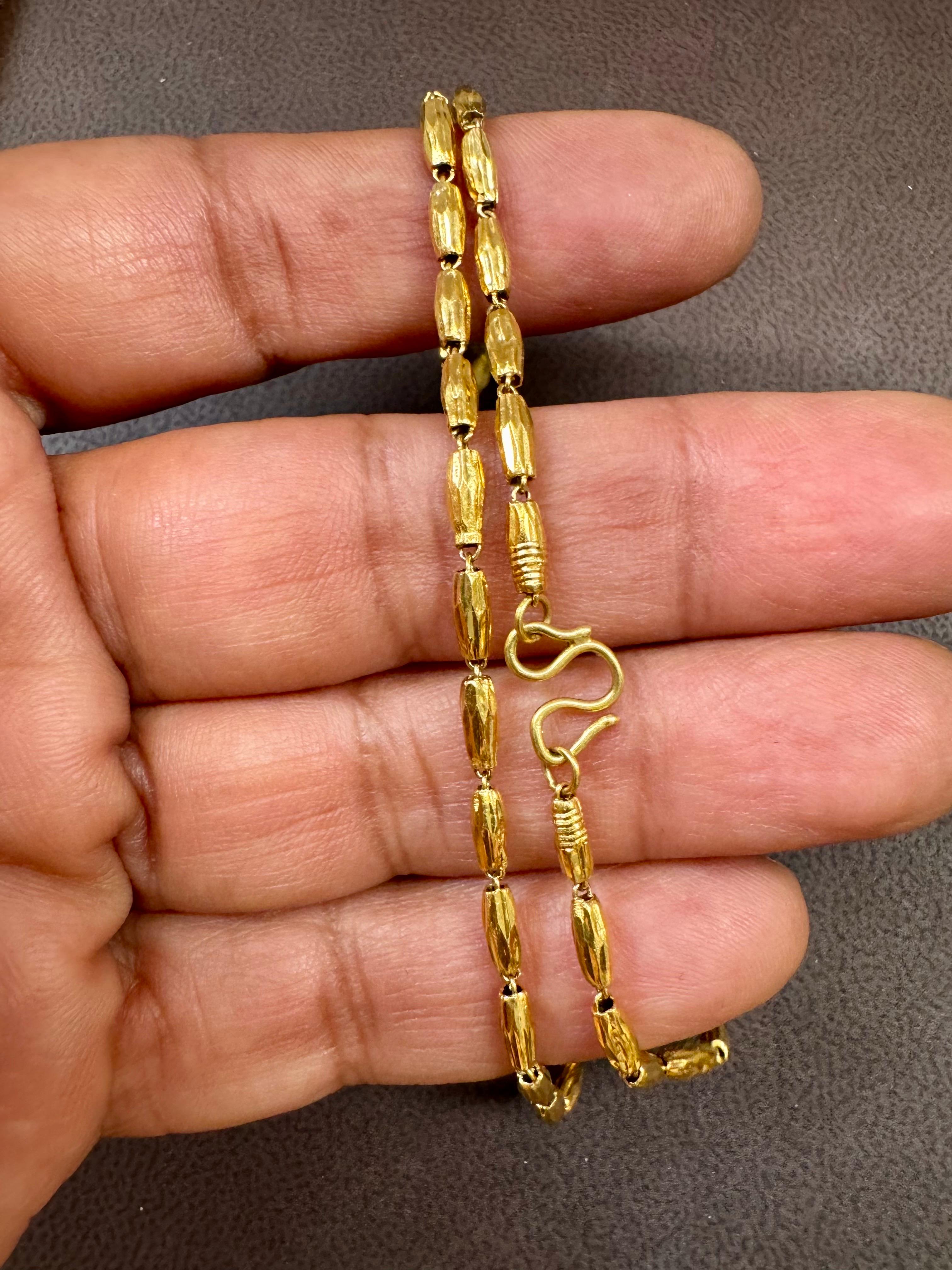 24 Karat Pure Gold Hand Made Yellow Gold Tube Chain Necklace,4 Gm, 16 Inch chain 
Simple Tube Chain  design , A rare pure gold Necklace
Weight of the Necklace  is 4 Grams . 
Stamped 9999
S shape hook
2.0 mm Wide  chain

Please look at all the