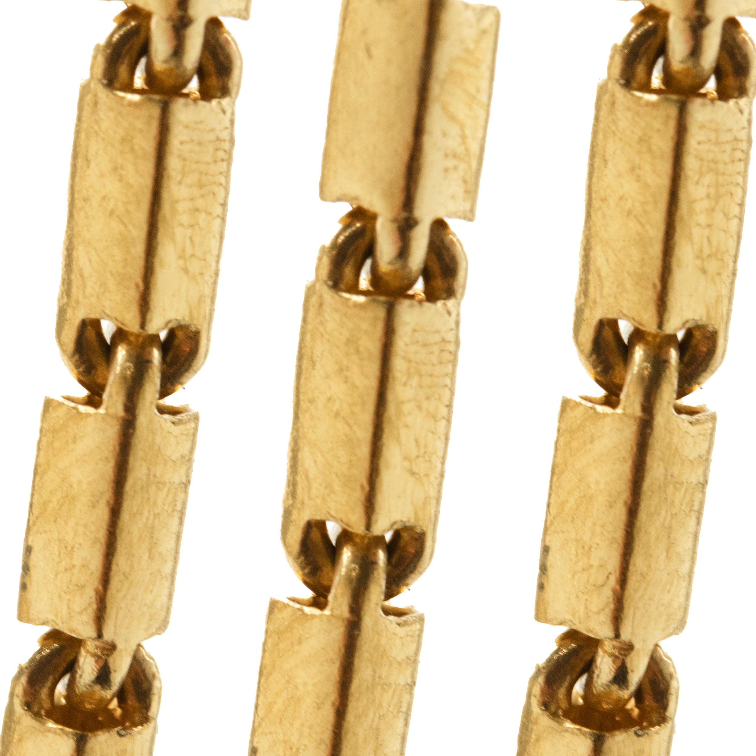 Material: 24K yellow gold
Dimensions: necklace measures 22-inches in length, 3mm wide
Weight: 30.18 grams
