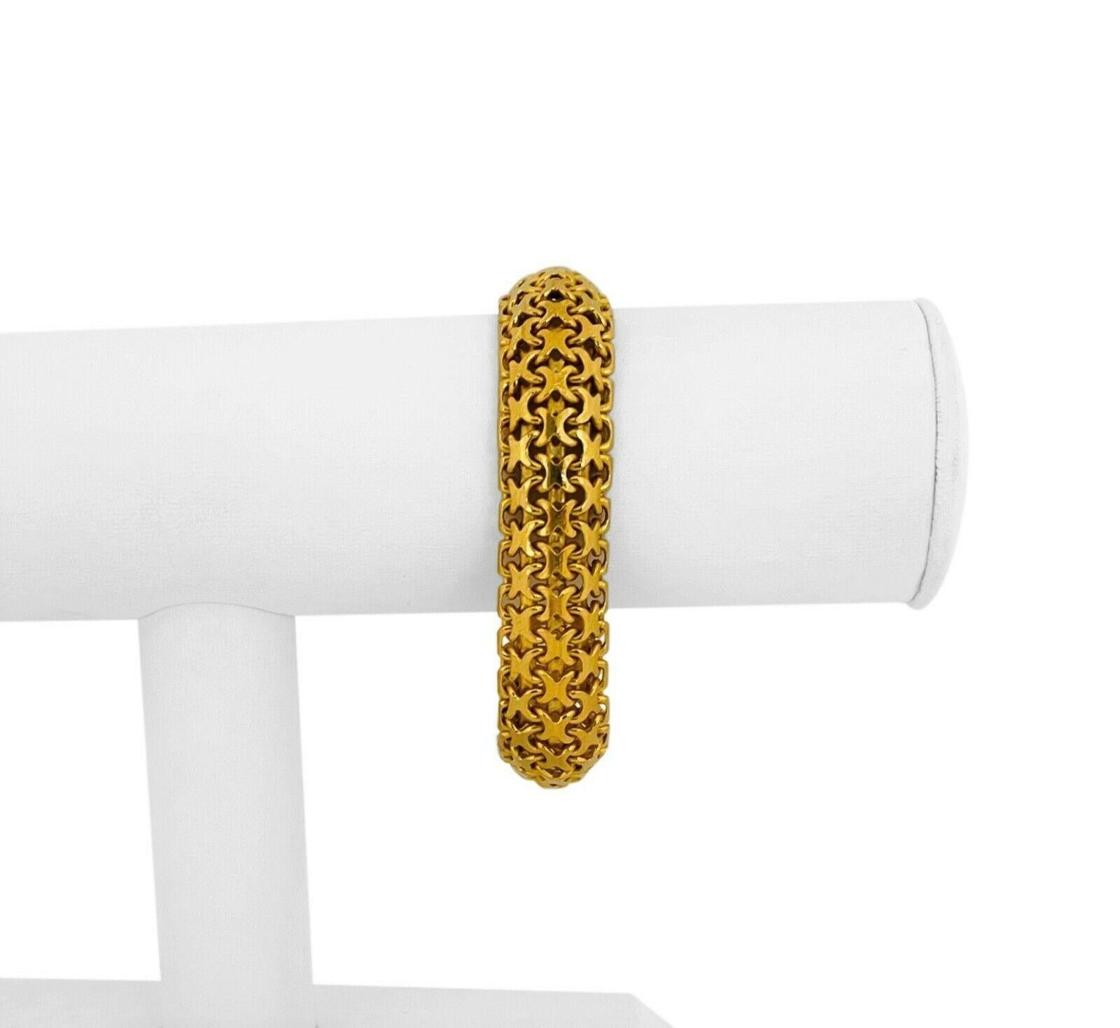 Condition:  Excellent Condition, Professionally Cleaned and Polished
Metal:  24k Gold (Marked, and Professionally Tested)
Weight:  57.9g
Length:  7.25 Inches
Width:  14mm
Closure:  Large Hook
Markings:  