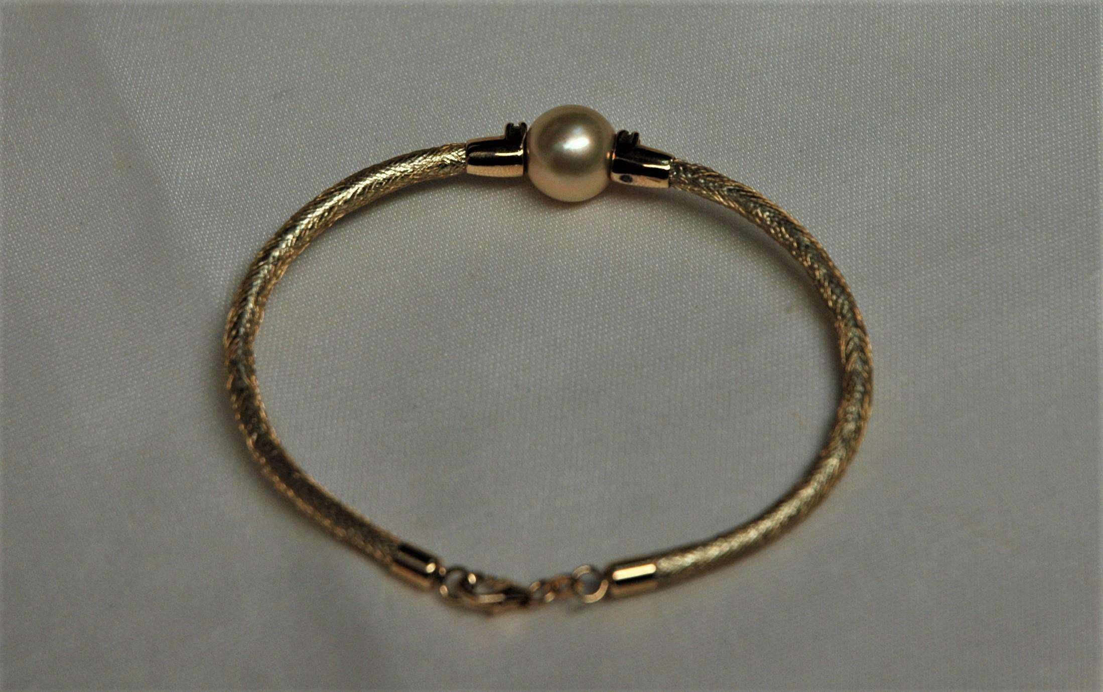 Brilliant Cut 18 Kt. Gold Bracelets with Pearls and Diamonds For Sale