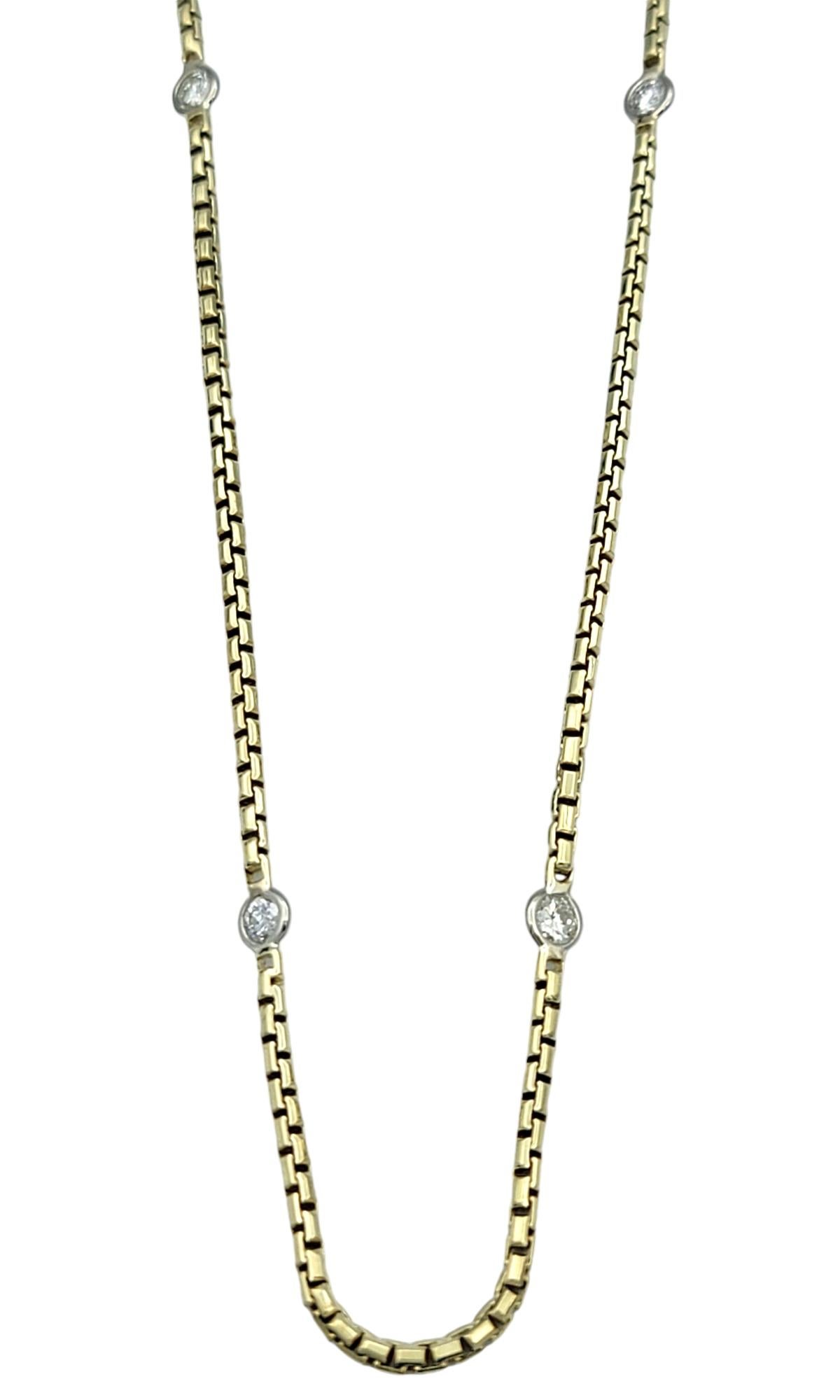 Exude timeless elegance with this 24-inch diamond station necklace, a piece that radiates effortless sophistication and refined charm. Each carefully selected diamond is gracefully set within lustrous 14 karat yellow gold round bezels, creating a