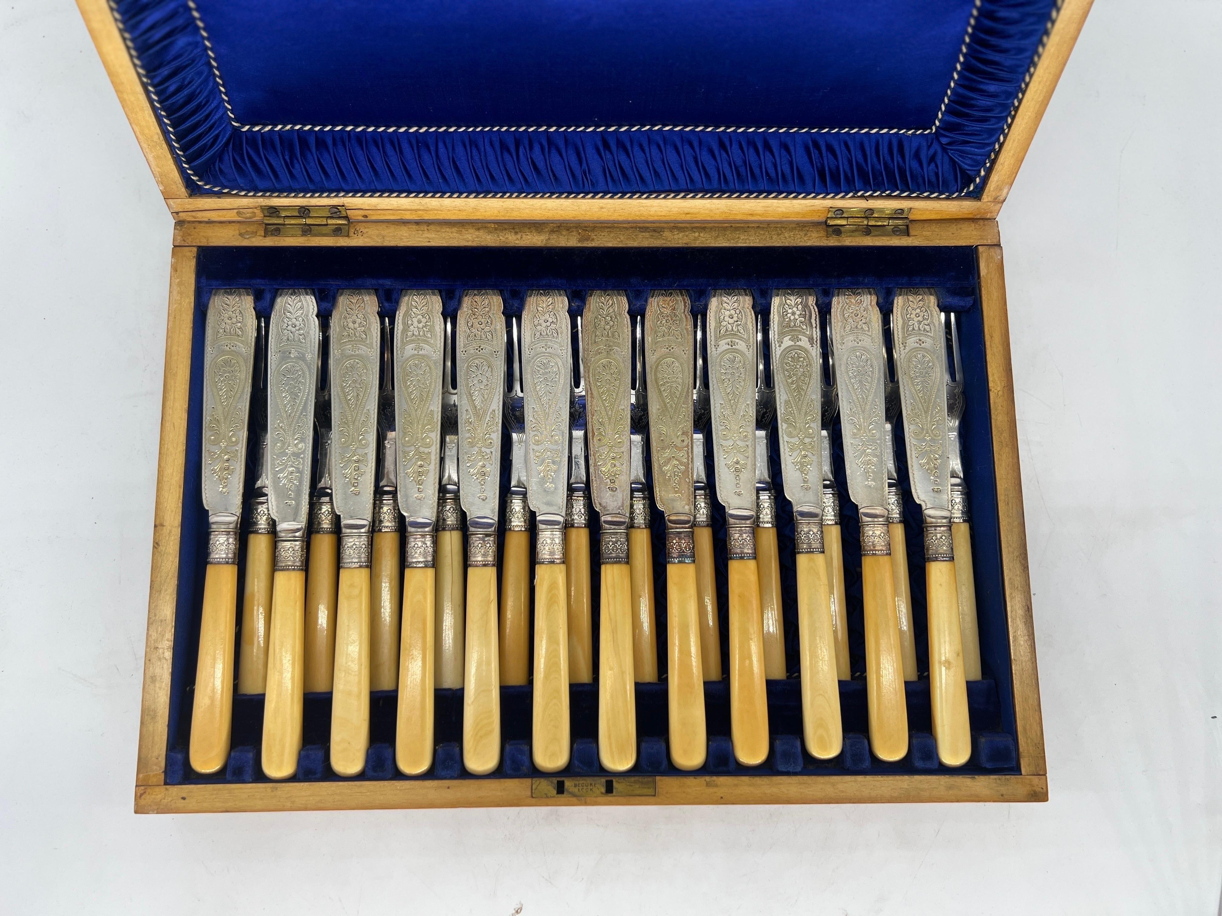 English, early 20th century.

A fine cased fish or dessert set comprising of 12 forks and 12 knives. Each with beautifully hand engraved silver plated surfaces, sterling silver collar and a bone handle. All housed inside a velvet lined case made for