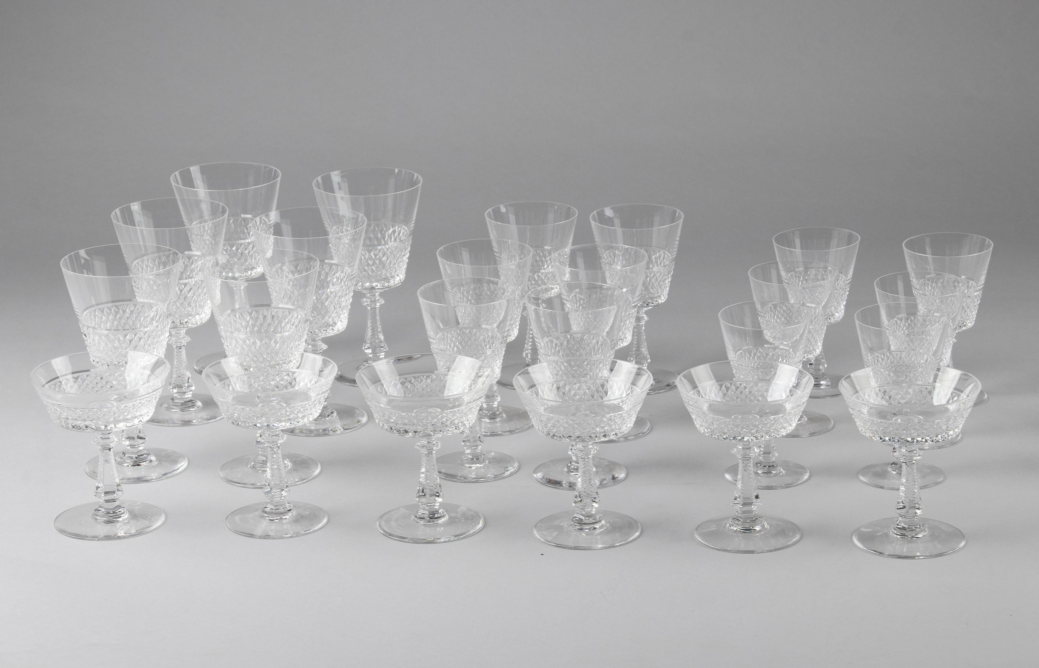 Beautiful set of 24 crystal glasses from the Belgian brand Val Saint Lambert. The glasses have a beautiful cut with a diamond pattern and a beautiful cut stem. The model's name is Heidelberg. Most glasses are signed on the bottom (not all). The