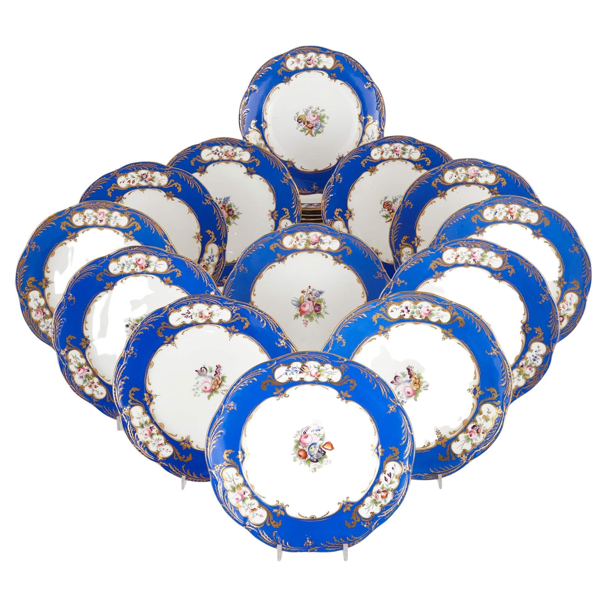 Set of twenty four blue and white floral porcelain dinner plates