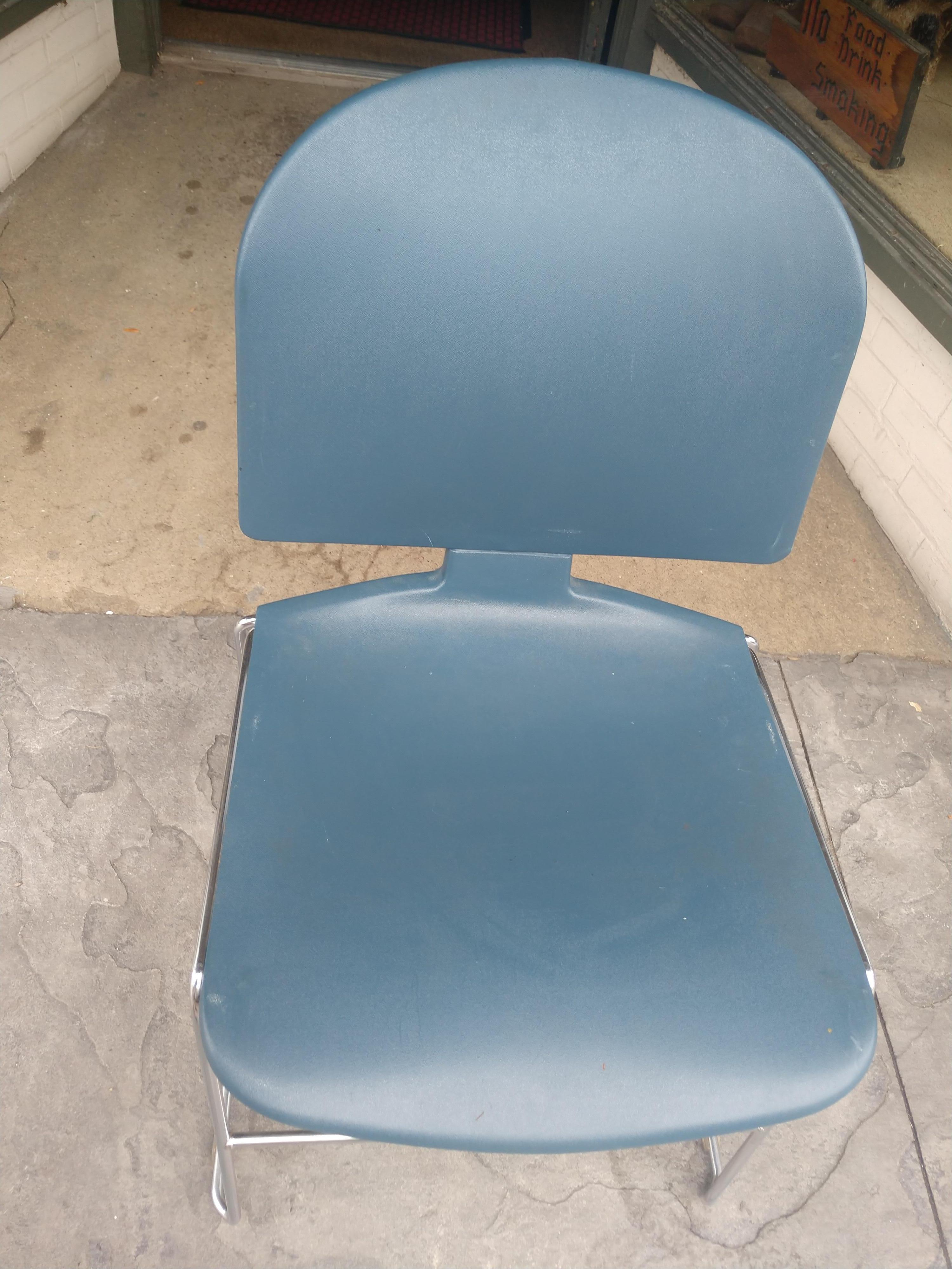 Fabulous chromed steel tubes with hard plastic seats that are very comfortable and stack as high as need be. Blue and black in color. Some scratches nothing very deep. Seat hgt is 17.25. Priced individually. Great for a conference or dining room.