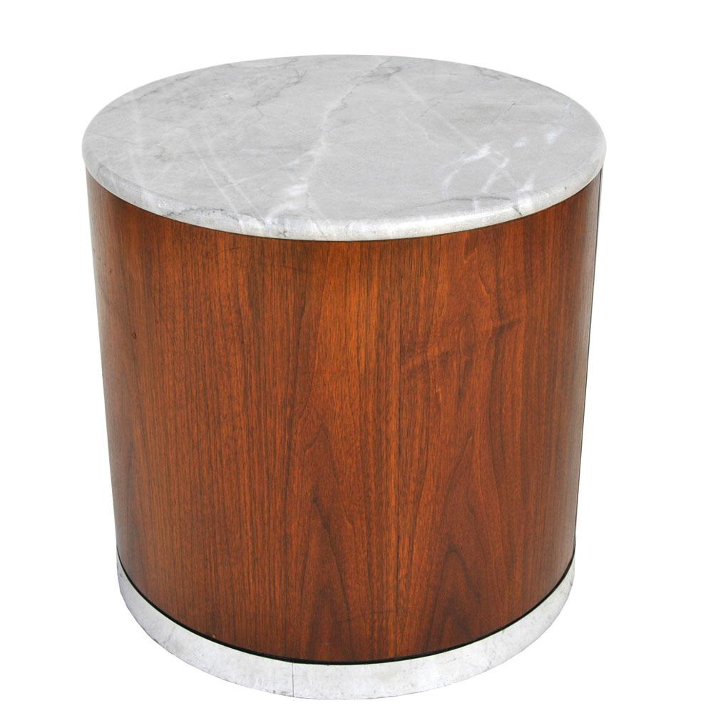 Marble pedestal stand side end table in the style of Milo Baughman

This drum table is a rich combination of walnut veneer, marble, and chrome.