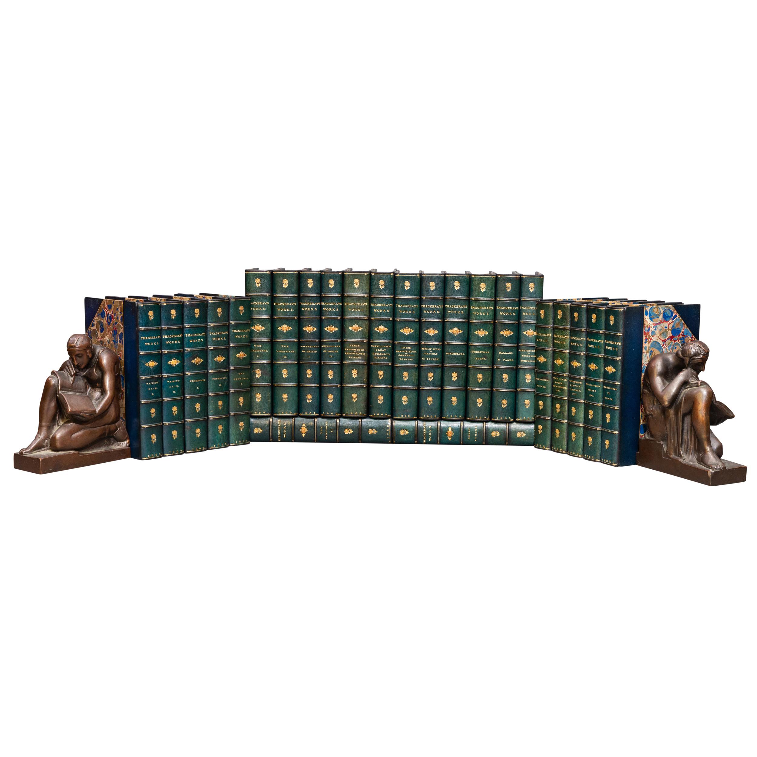 24 volumes. William Makepeace Thackeray, The Works of William Makepeace Thackeray. Bound in 3/4 blue morocco. Marbled boards. Top edges gilt. Raised bands. Decorative floral symbols on spine. Marbled endpapers. Illustrated. Published: London; Smith,