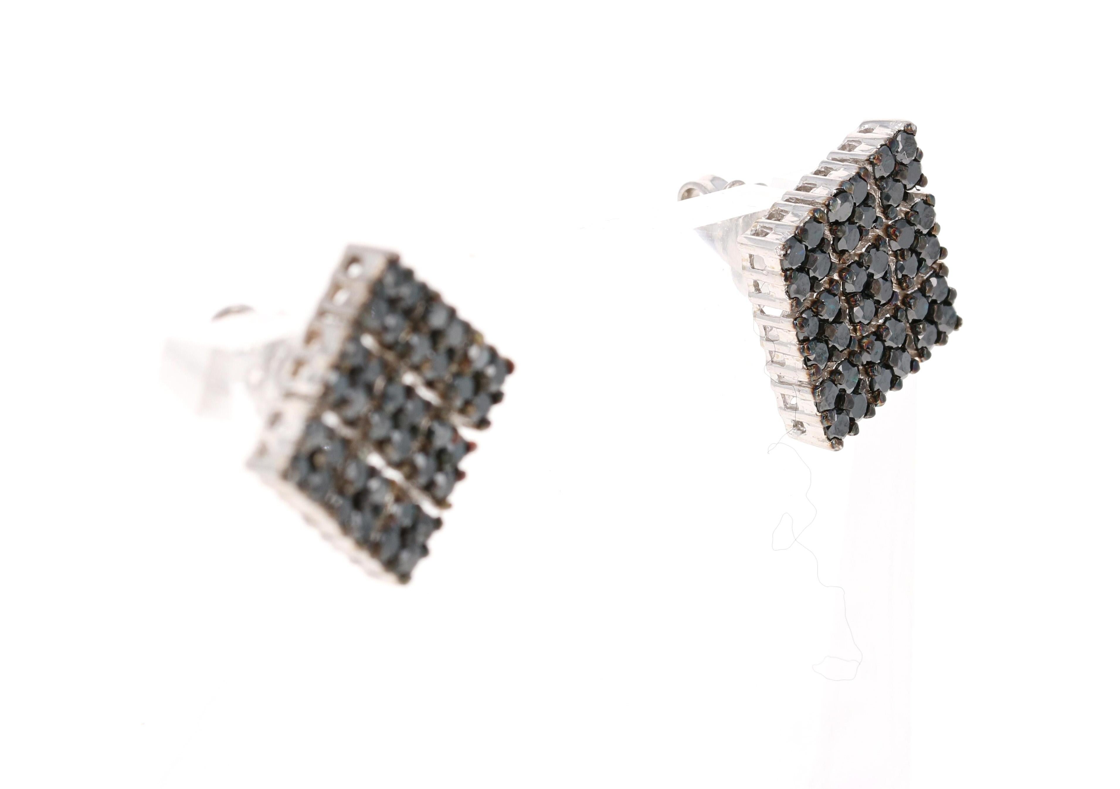 These earrings have 72 Black Round Cut Diamonds that weigh 2.40 Carats. 

Curated in 14 Karat White Gold and weigh approximately 7.2 grams. 

The width of the earrings are 0.5 inches.
