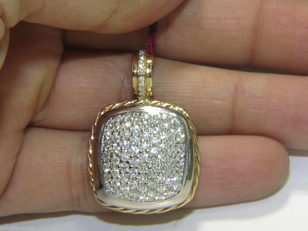 2.40ct. Diamonds, French Pave set pendant.

Excellent rope twist deco on side and sparkle

Diamonds: G-color Vs-2 clarity.

14kt. white and yellow gold. 

16.0 grams

overall pendant: 23.95mm wide

length with bale: 35.00mm

depth: 9mm.

Pendant has
