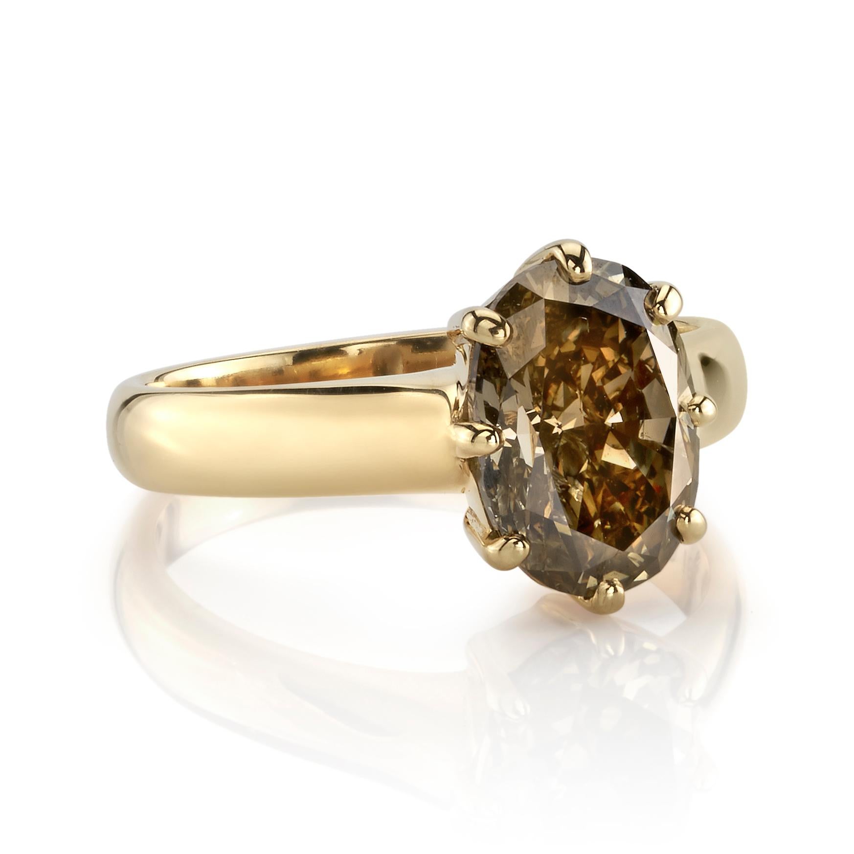 2.40ctw Fancy Dark Brown/I1 GIA certified Oval cut diamond set in a handcrafted 18K yellow gold mounting. 

Ring is currently a size 6 and can be sized to fit.

Our jewelry is made locally in Los Angeles and most pieces are made to order. For these