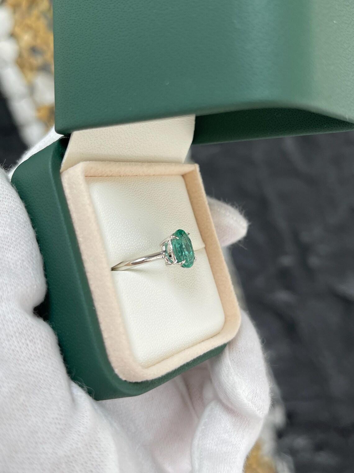 Oval Cut 2.40 Carat Features Emerald With Oval And Round Cuts Toi Et Moi Ring For Sale