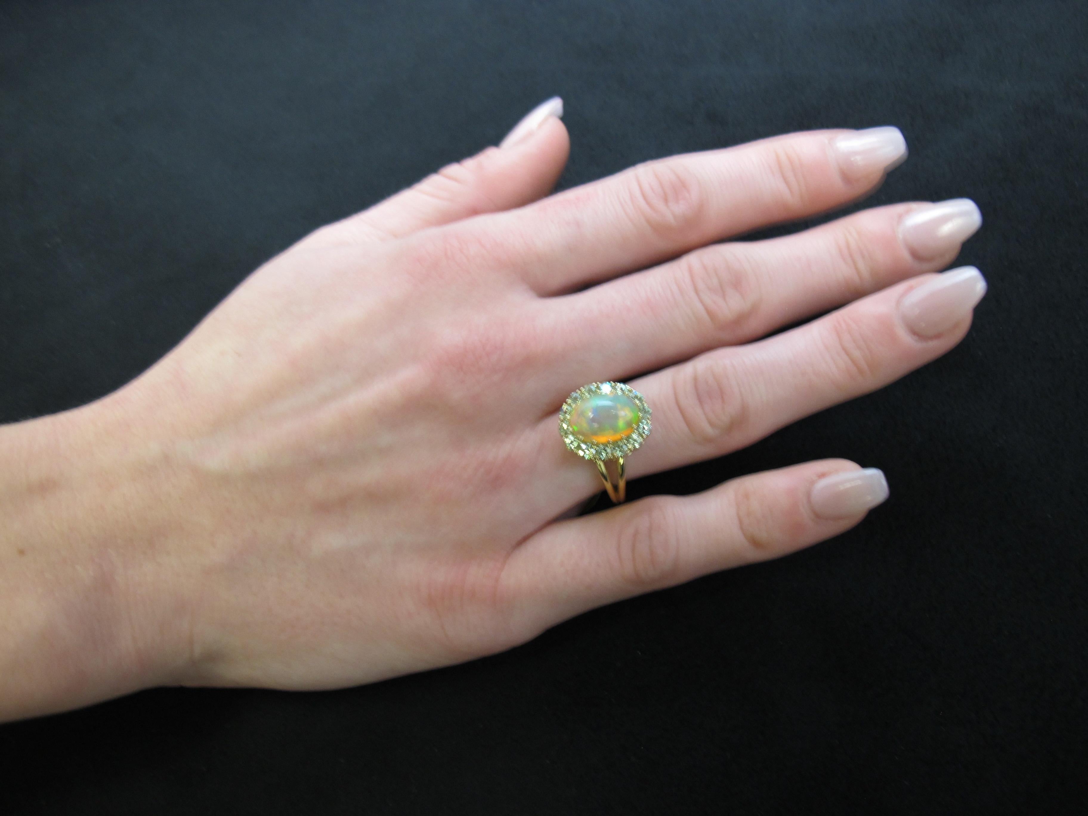 2.40 Carat Opal and Tsavorite Garnet Halo Cocktail Ring in 18k Yellow Gold  For Sale 3