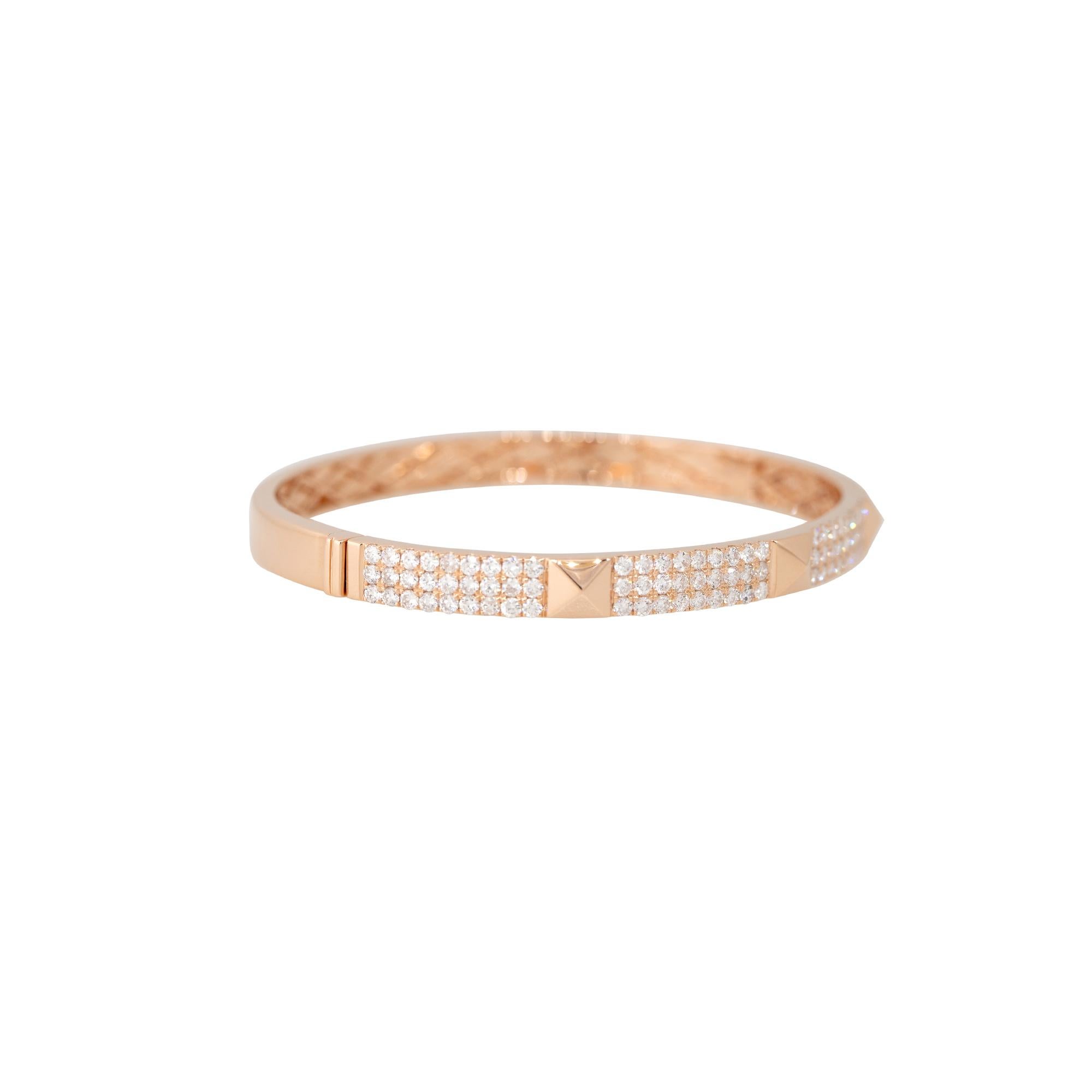 18k Rose Gold 2.40ctw Pave Diamond Rock Stud Bangle Bracelet
Material: 18k Rose Gold
Diamond Details: There are approximately 2.40 carats of round brilliant-cut diamonds halfway around the bangle
Diamond Clarity: All diamonds are approximately SI
