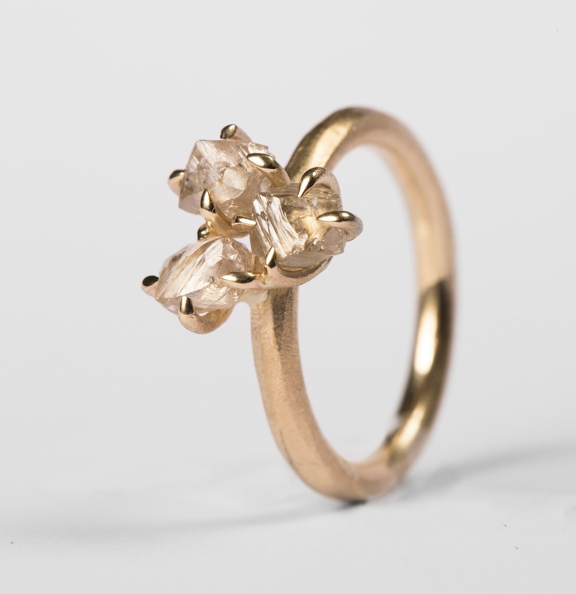 2.40 ct. Natural Whitish Rough Diamonds in 14K handcrafted gold ring

Origin of Diamond: Russia  

Every rough diamond from Roughdiamonds dk has been personally handpicked by Maya Bjørnsten. The diamonds we reject are sent back to be cut into