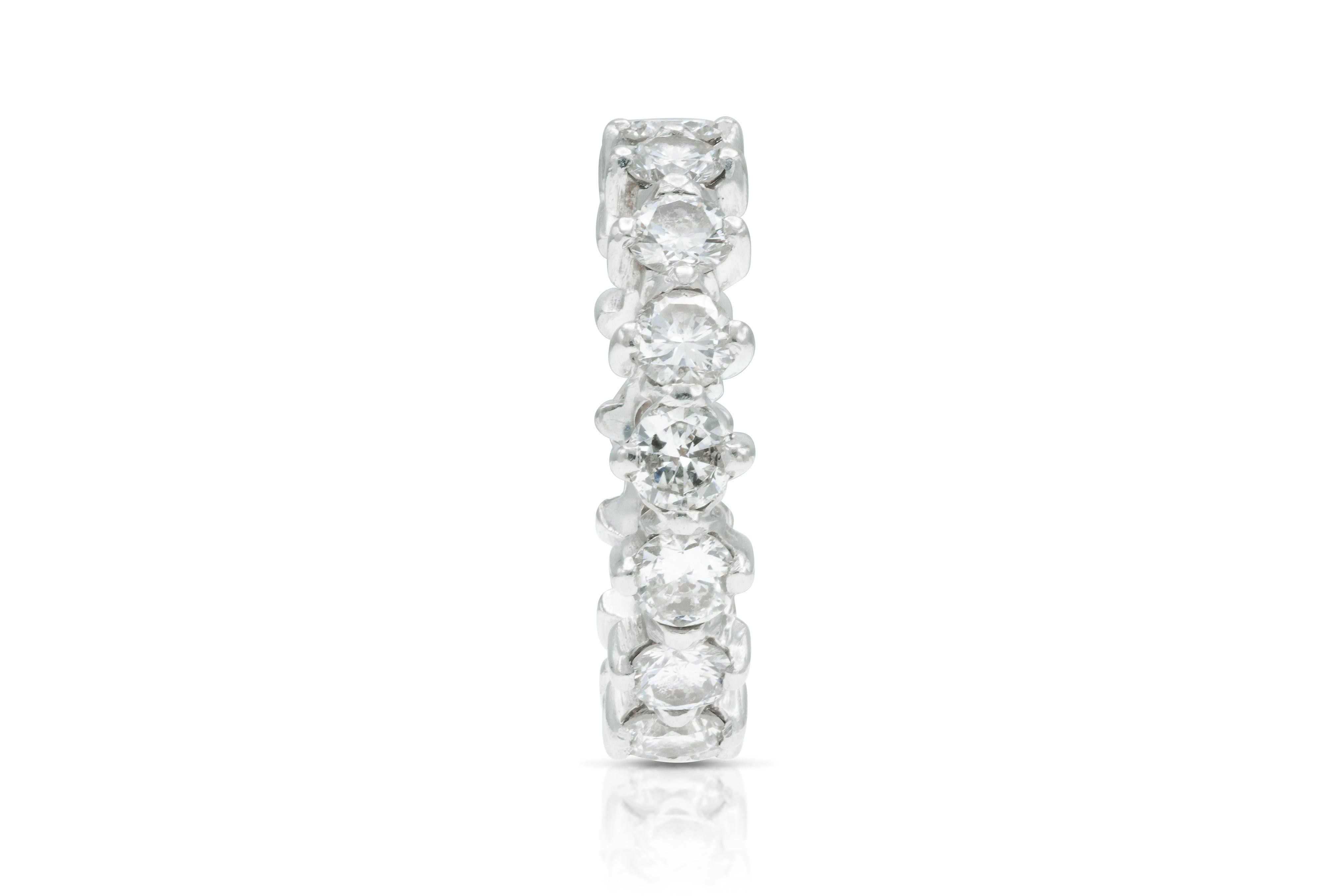 Finely crafted in platinum with 16 Round Brilliant cut Diamonds weighing approximately a total of 2.40 carats.
Size 6