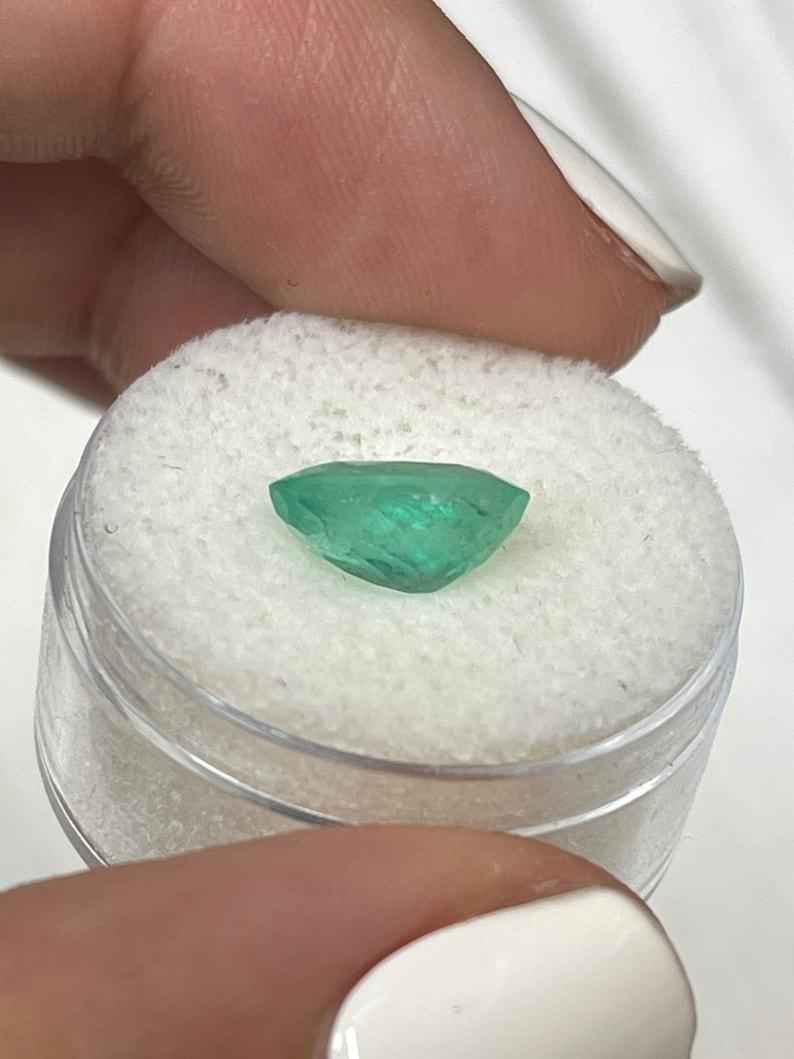 2.40 Carat Slender Medium Light Green Colombian Emerald - Oval Cut May Gem For Sale 1