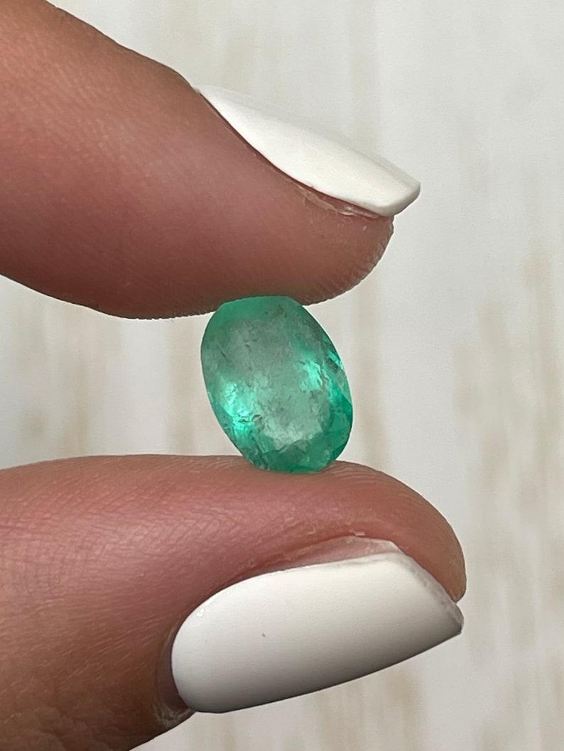 2.40 Carat Slender Medium Light Green Colombian Emerald - Oval Cut May Gem For Sale 2