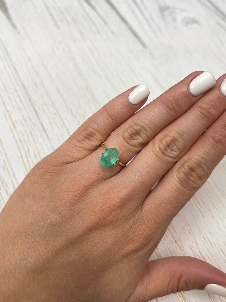 2.40 Carat Slender Medium Light Green Colombian Emerald - Oval Cut May Gem For Sale 3