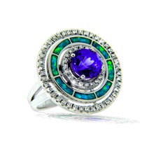 2.40 Carat Tanzanite and Opal 18 Karat Gold Ring