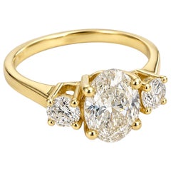 Anello con tre diamanti da 2,40 carati, diamante ovale da 1,80 carati F VS1, oro 14 carati