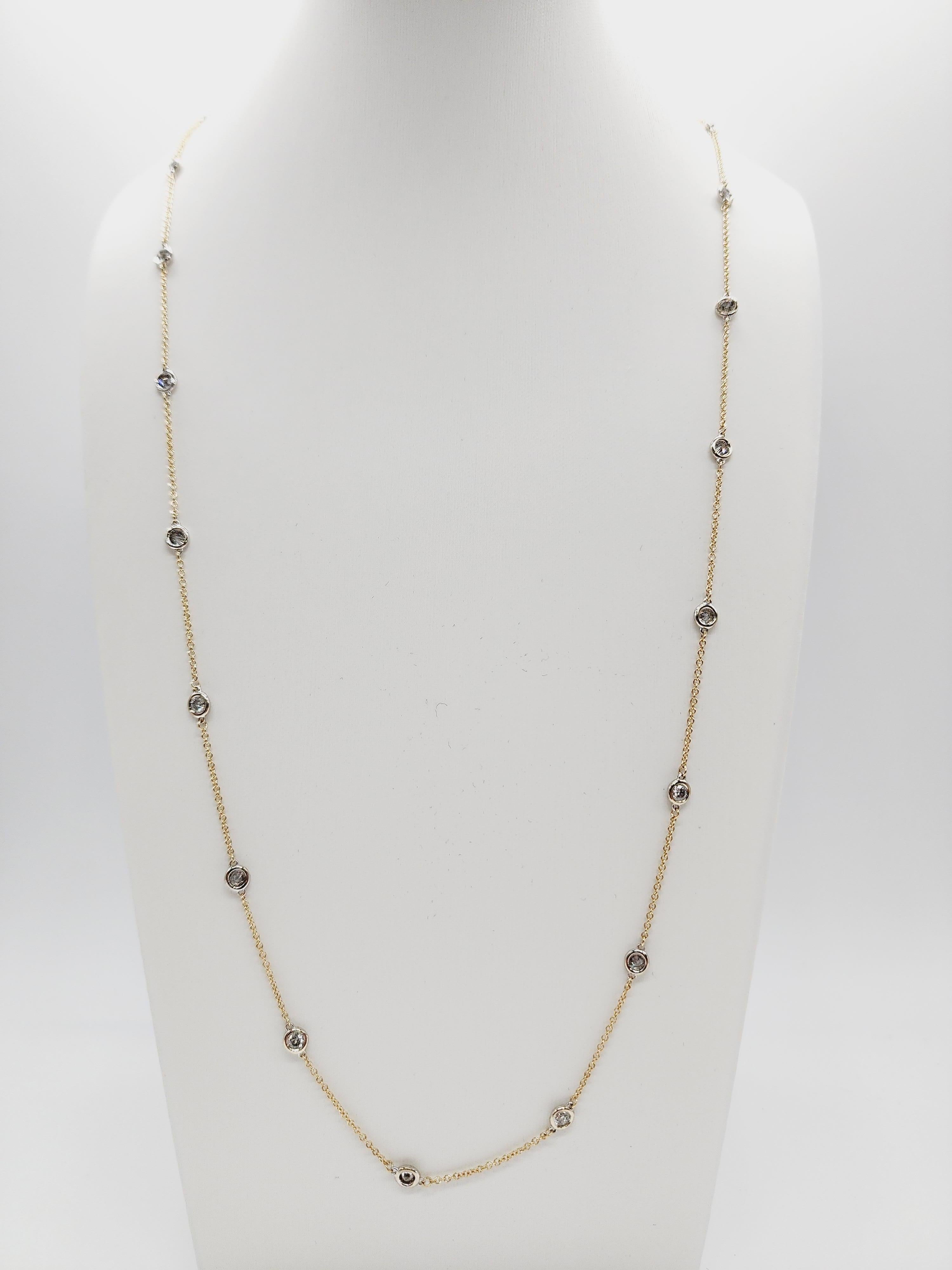 25 Station Diamond by the yard necklace set in Italian made 14K two tone gold. 
total weight is 2.40 carats. Beautiful shiny stones. total length is 30 inch. Average G-I1.