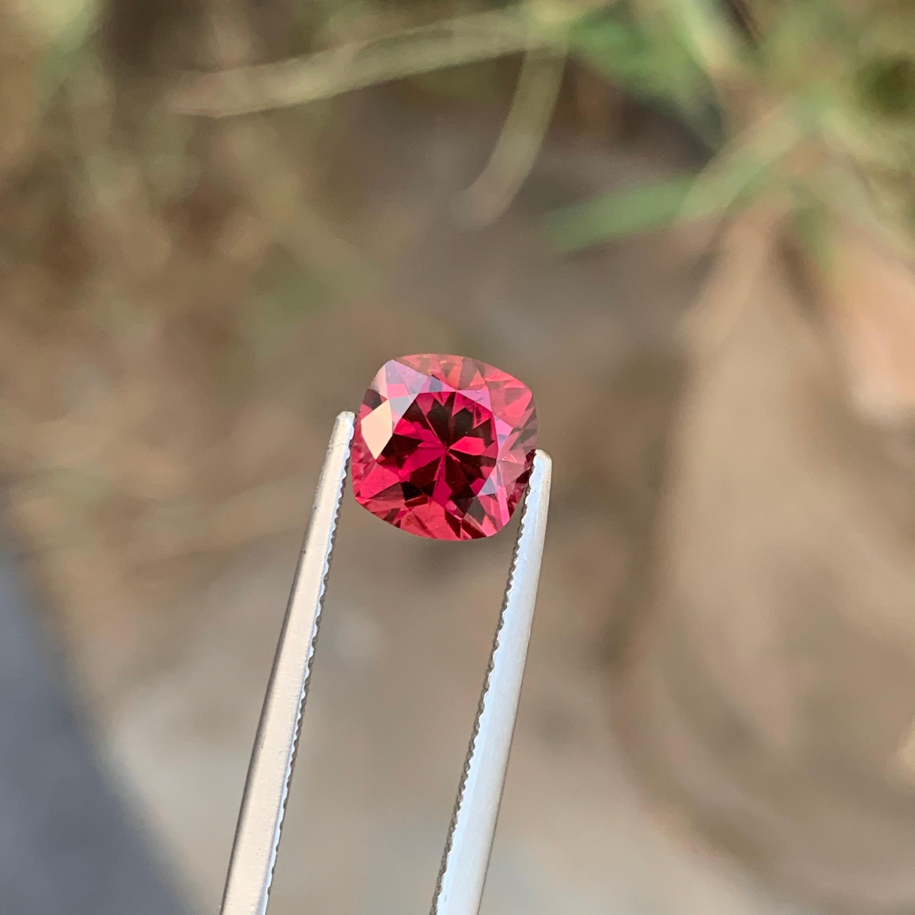 Faceted Rhodolite Garnet
Weight: 2.40 Carats 
Dimension: 7.6x7.5x5.3 Mm
Origin: Tanzania Africa 
Color: Red
Shape: Cushion 
Cut/Facets: Precision
Treatment: None
Certificate; On Customer Demand 
Rhodolite is a gemstone that exudes elegance and