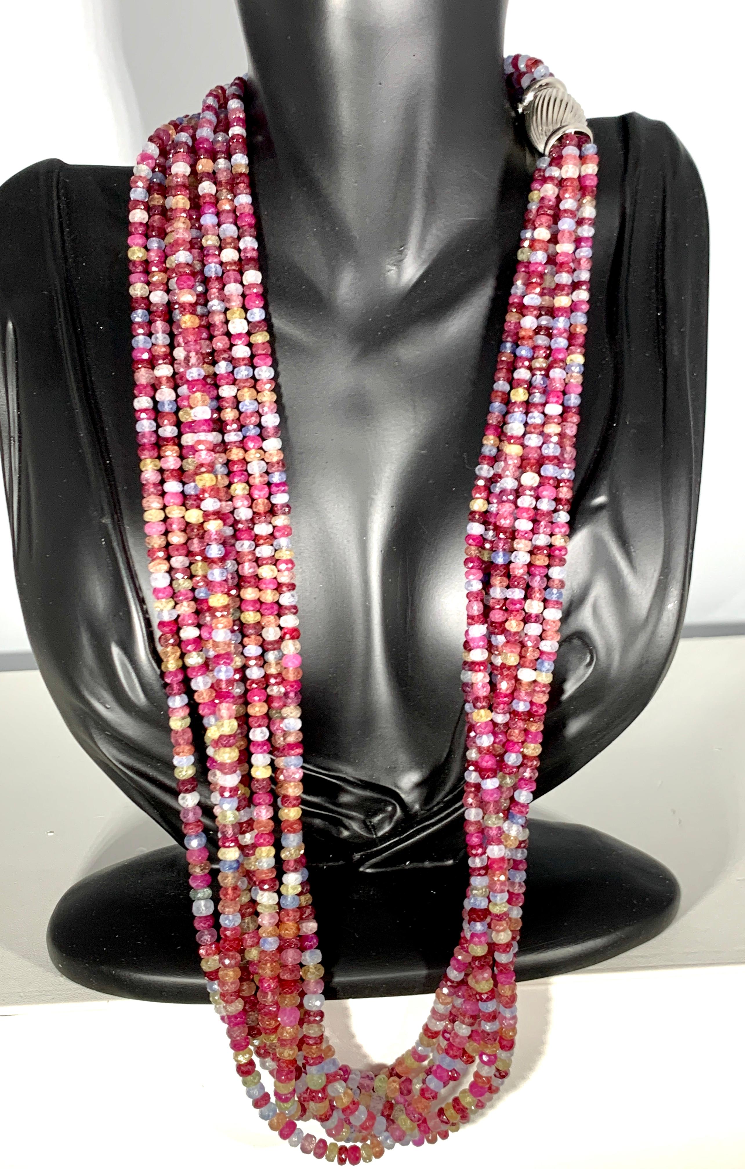  2400 Ct  8 Layer Natural Multi Sapphire Fine Bead Necklace 18 Karat White  Gold  Clasp
This spectacular Necklace   consisting of approximately 2400 Ct   of  Fine Multi Sapphire  Beads.
Colors are different shades of pink , Green , Brown and