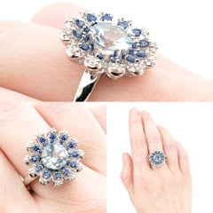 Anello con acquamarina da 2,40 ct e zaffiro blu da 0,60 ct in oro bianco