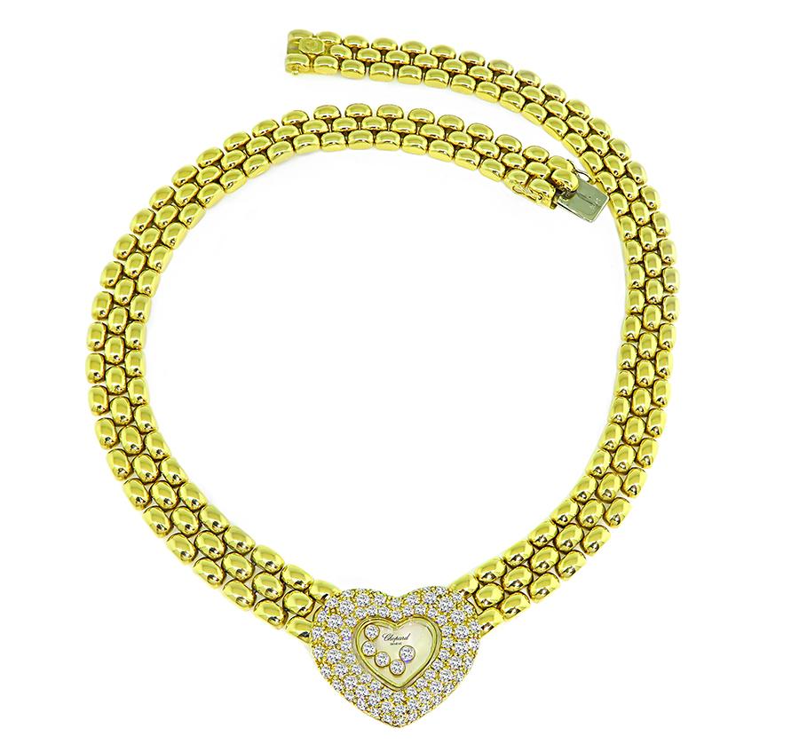 This is an elegant 18k yellow gold happy heart necklace by Chopard. The necklace is set with sparkling round cut diamonds that weigh approximately 2.40ct. The color of these diamonds is E-F with VS clarity. The necklace measures 15 1/2 inches in
