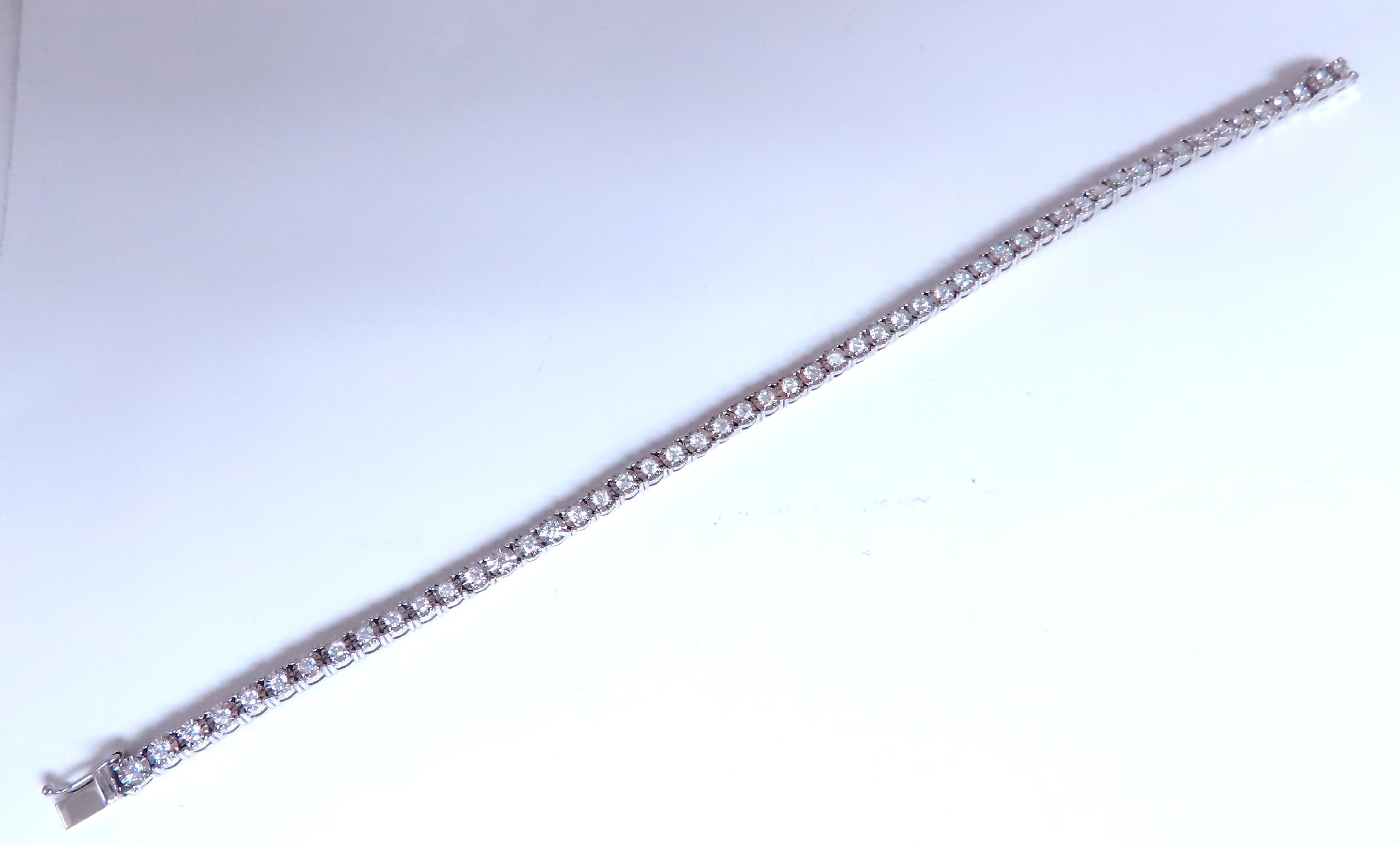 natural 2.40ct diamonds bracelet
diamond cut encasing. 
63 diamonds
g-color vs-2 clarity
14kt white gold 
14.8 grams
8 inches
$14,000.00 appraisal to accompany