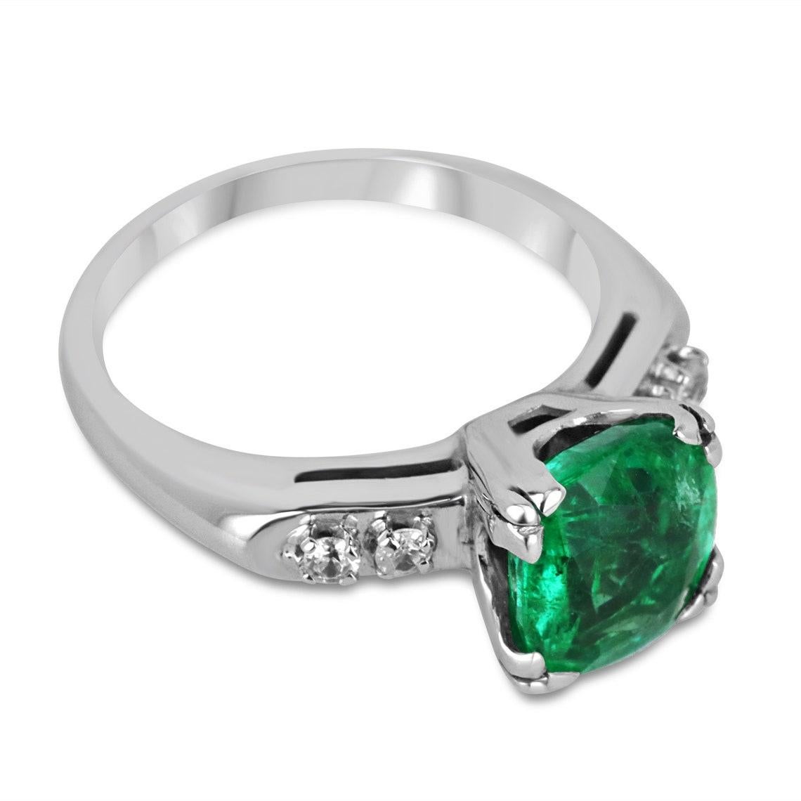Adorn your hand with the exquisite beauty of our Emerald and Diamond Five Stone Ring, where elegance meets opulence in perfect harmony. At the heart of this captivating piece is a stunning cushion cut emerald, radiating a rich lush green hue with