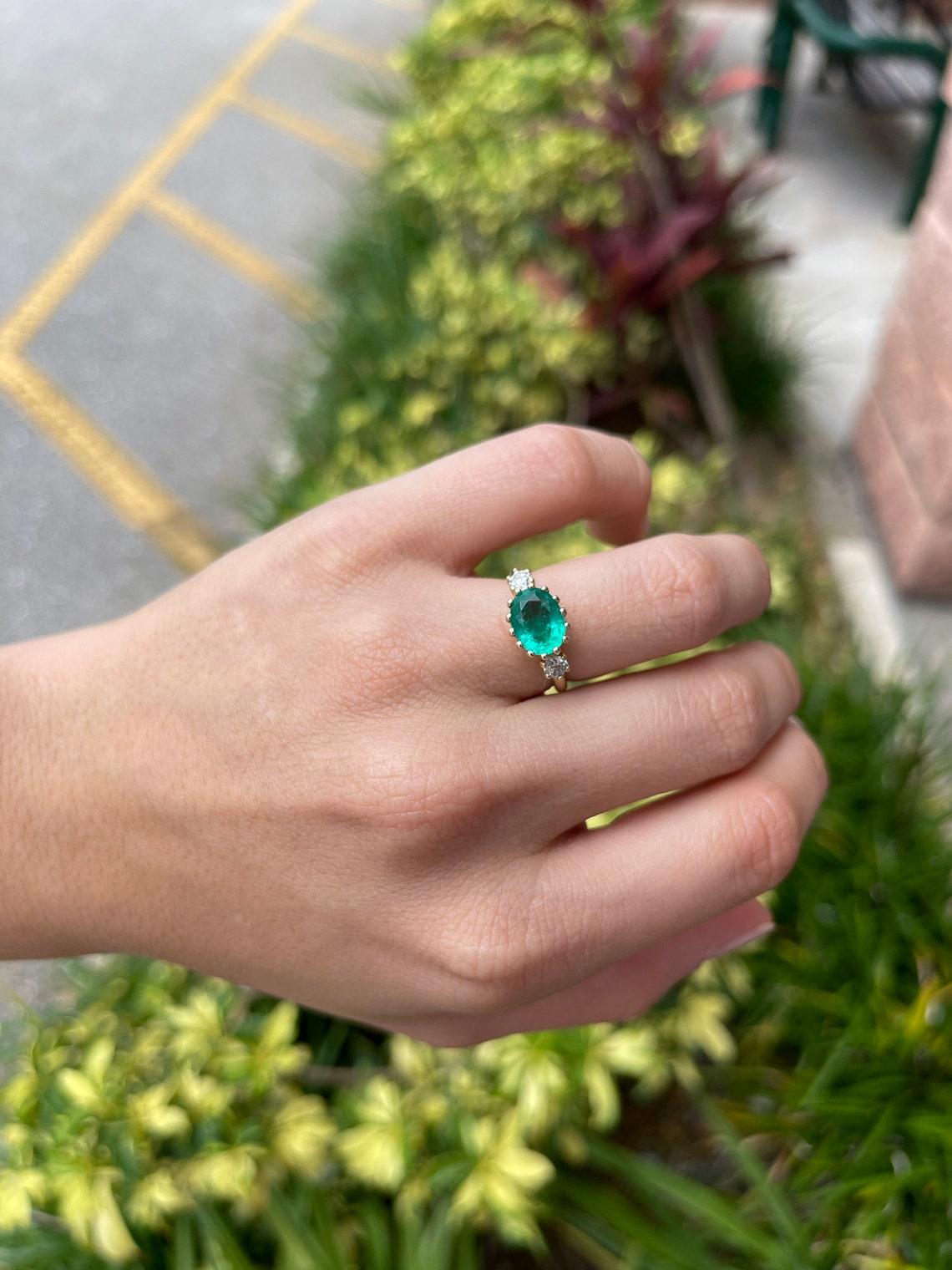 emerald oval engagement ring