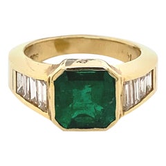 2.41 Carat Emerald Cut Emerald with Baguette Diamond Yellow Gold Ring