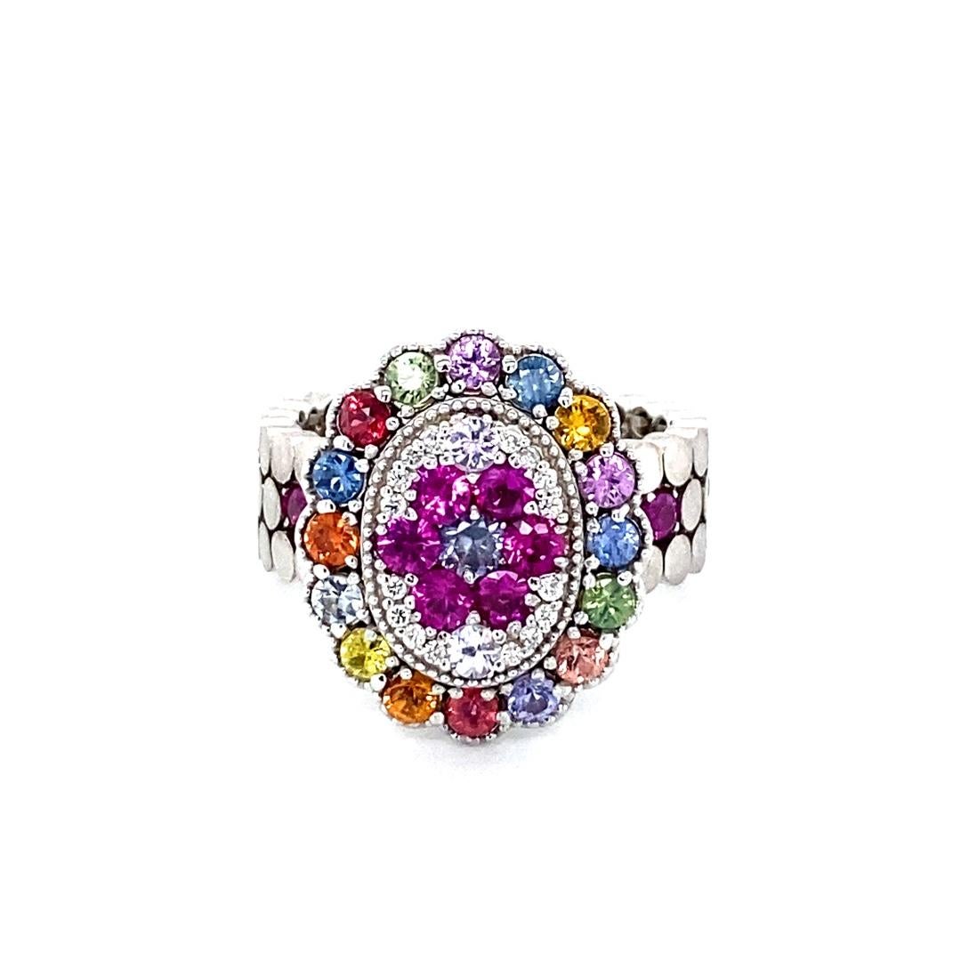Super gorgeous and uniquely designed 2.41 Carat Multi Color Sapphire 14 Karat White Gold Cocktail Ring!

This ring has a cluster of 31 Round Cut Natural Multi Color Sapphires that weigh 2.33 carats and 16 Round Cut Natural Diamonds that weigh 0.08