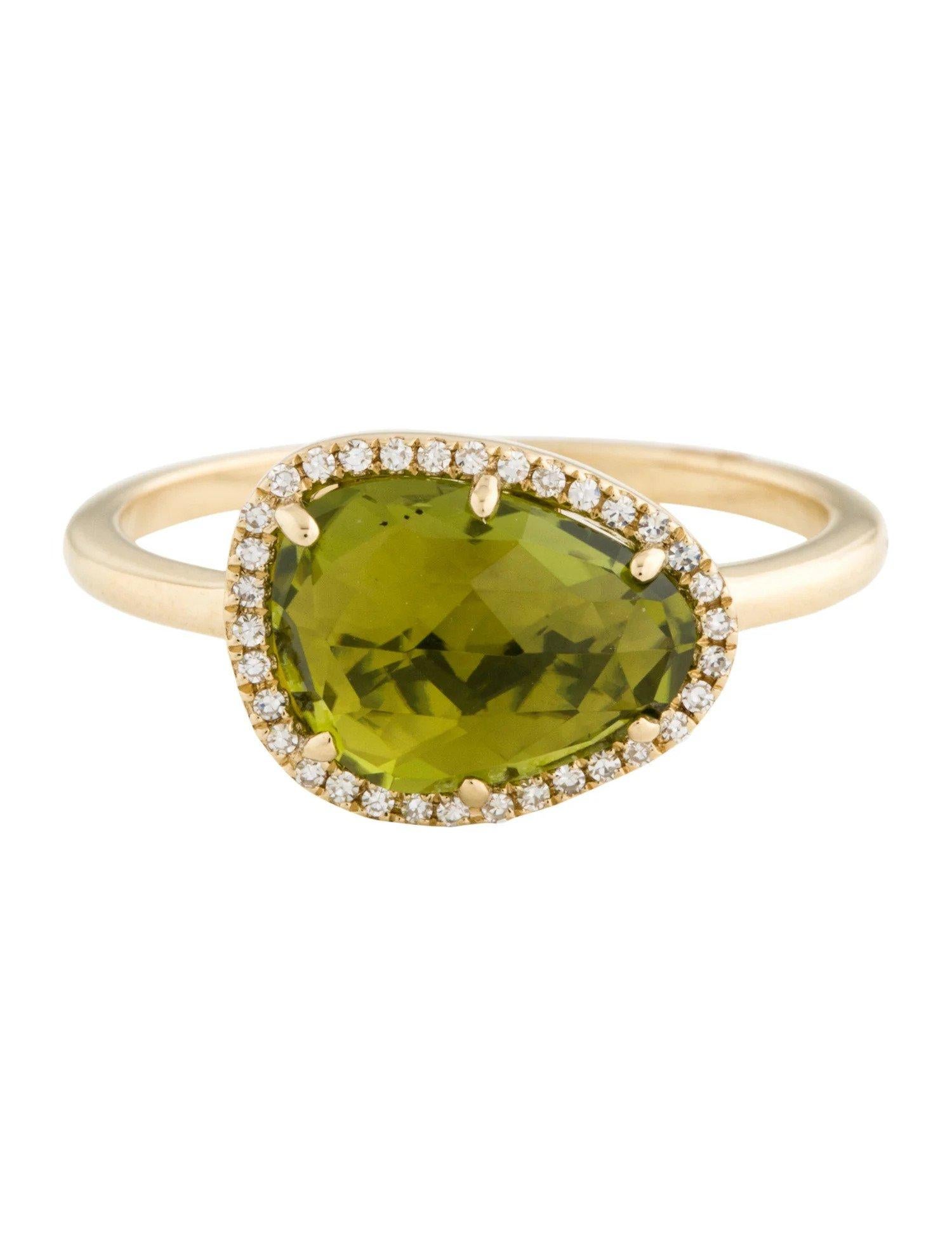 This Peridot & Diamond Ring is a stunning and timeless accessory that can add a touch of glamour and sophistication to any outfit. 

This ring features a 2.41 Carat Peridot (12 x 9 MM), with a Diamond Halo comprised of 0.08 Carats of Single Cut