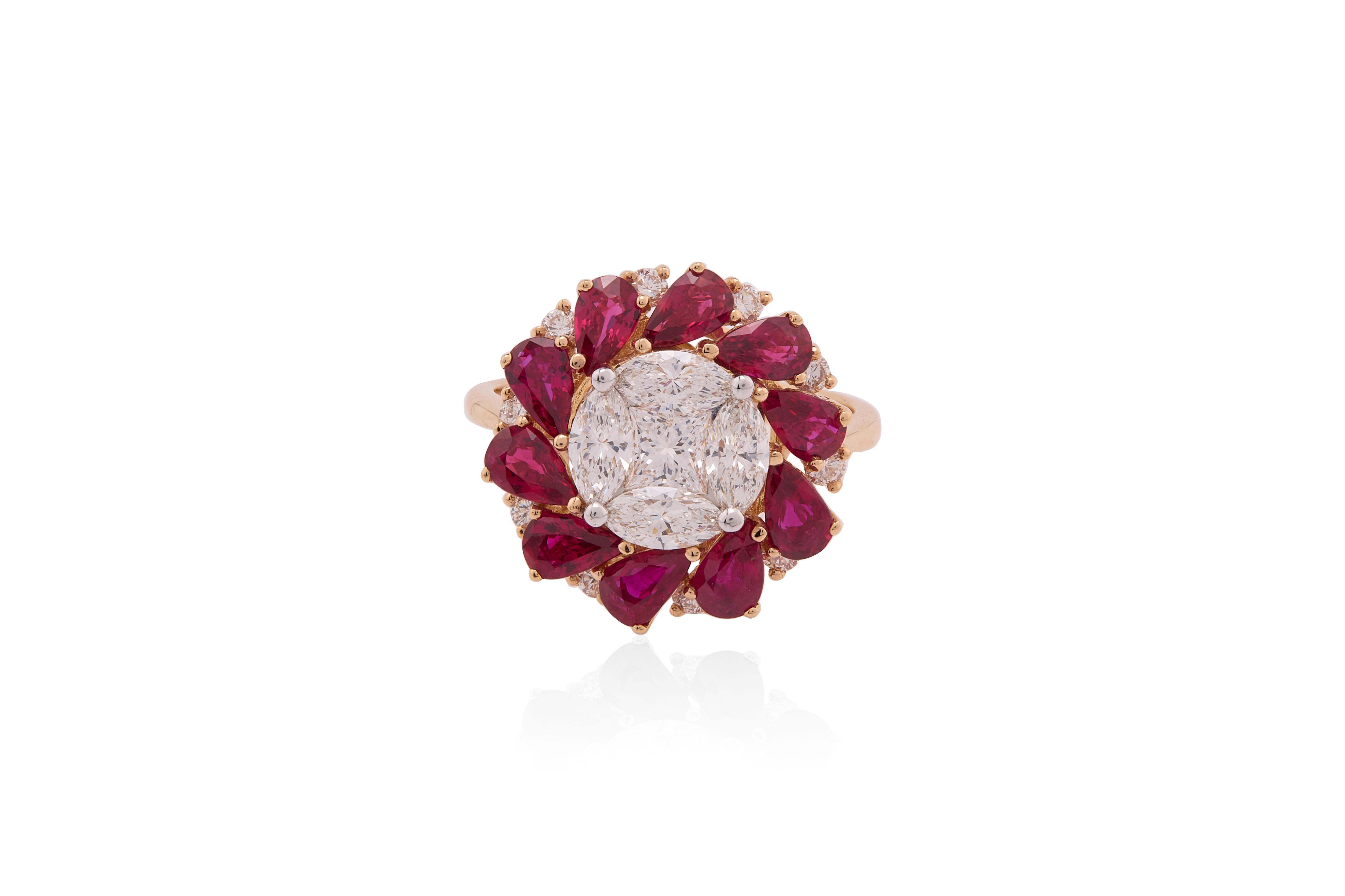 This stunning ring is a luxurious statement piece featuring a dazzling arrangement of diamonds and rubies set in a warm-toned gold band. At the center, a large cushion-cut diamond cluster catches the light from all angles, exuding brilliance and