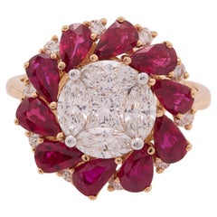 2.41 carats of Pear shape rubies with marquise and Diamond Ring in 18 Karat Gold