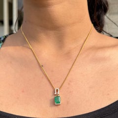2.41 Ct. Emerald Pendant in 14K Solid Yellow Gold with Diamond Horseshoe Design