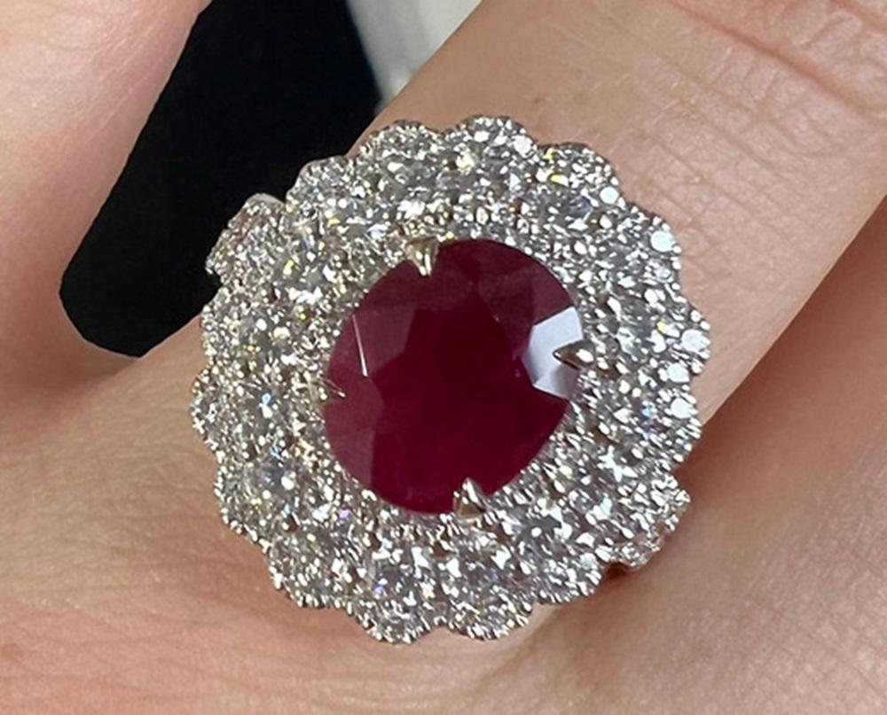 Ruby Weight: 2.41 CTS, Ruby Measurements: 8.91 x 7.04 mm, Diamond Weight: 1.39 CT, Metal: 18K White Gold, Ring Size: 6.5, Shape: Oval, Color: Red, Hardness: 9, Birthstone: July