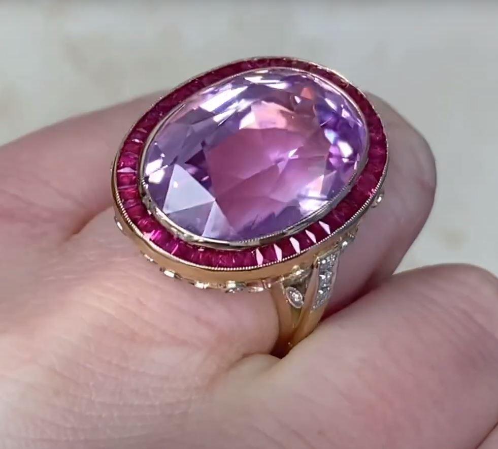 This exquisite gemstone ring showcases a breathtaking approx. 24.1-carat natural oval-cut kunzite, radiating a captivating pink hue with exceptional saturation. Its delicate yet vibrant color is beautifully complemented by a halo of meticulously set