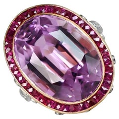 24.10ct Oval Cut Kunzite Cocktail Ring, Ruby Halo, 18k Yellow Gold