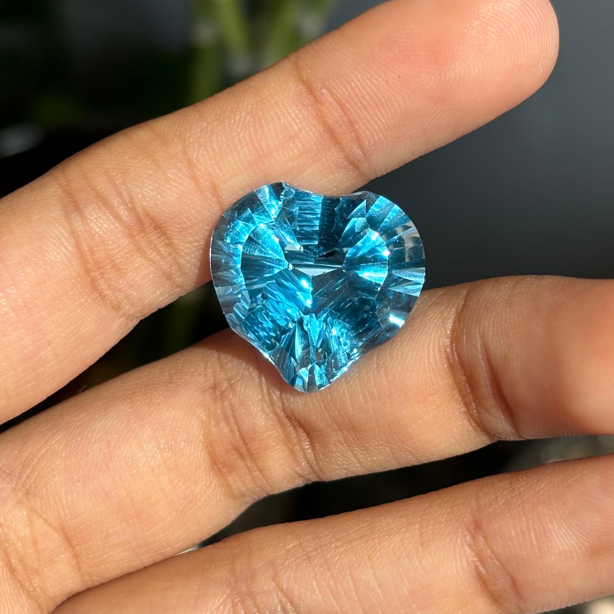 24.12 Carat Natural Blue Heart Shaped Topaz Stone For Sale 1